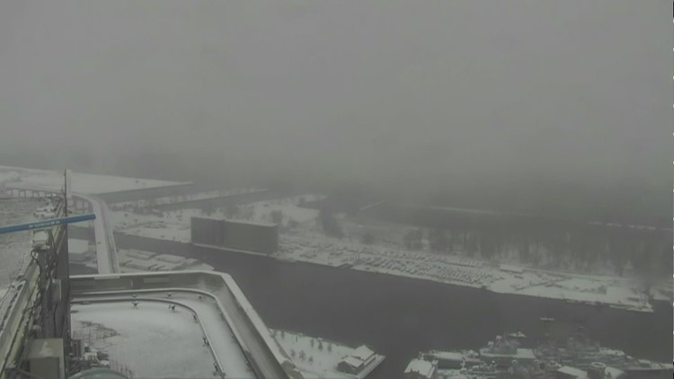 Watch as a lake effect snow band washes over Buffalo, New York