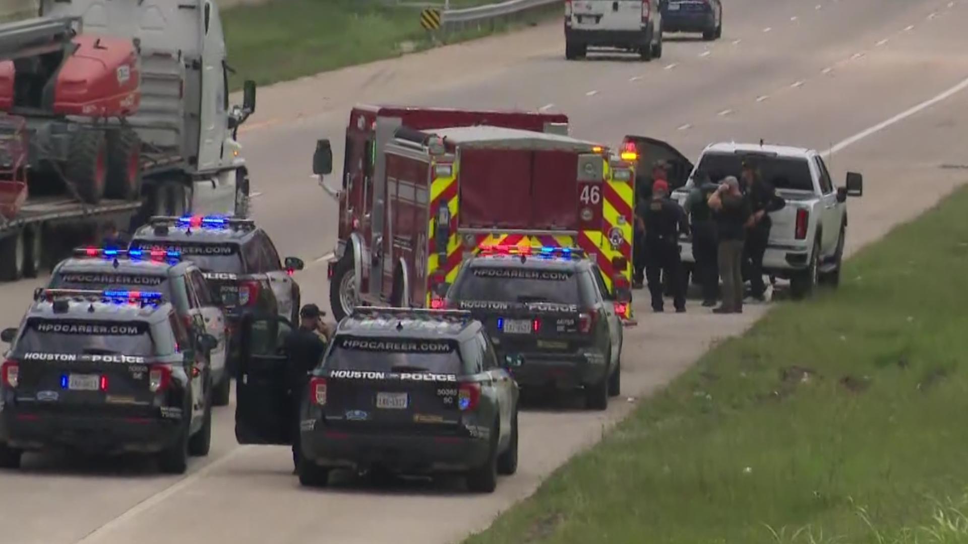 A woman in the Ford SUV was cut by shattered glass but no one was shot in either vehicle, according to the Houston Police Department. The gunman got away.