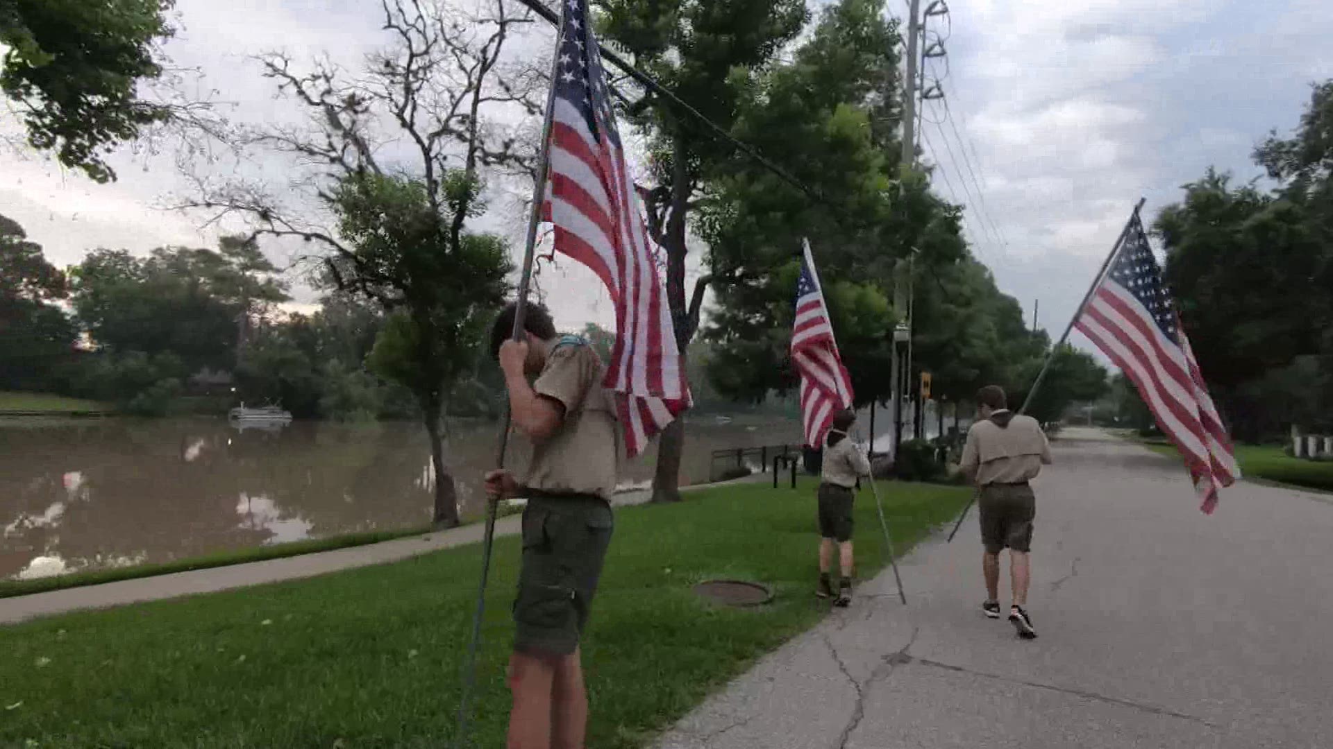 A Boy Scout troop in Sugar Land was up bright and early putting up hundreds of U.S. flags as part of a patriotic project.