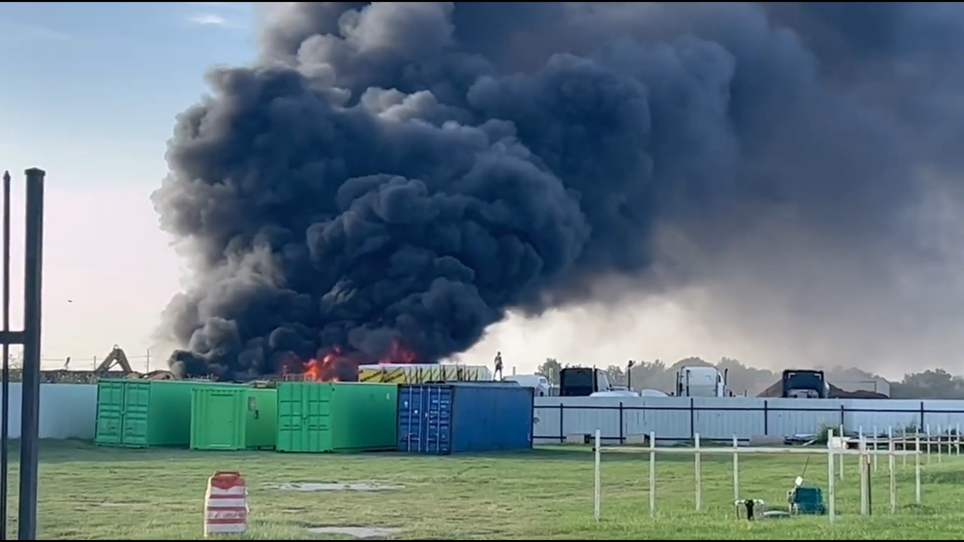 Flames and a towering plume of smoke were seen coming from a scrap metal facility on Katy Hockley Road in northwest Houston.