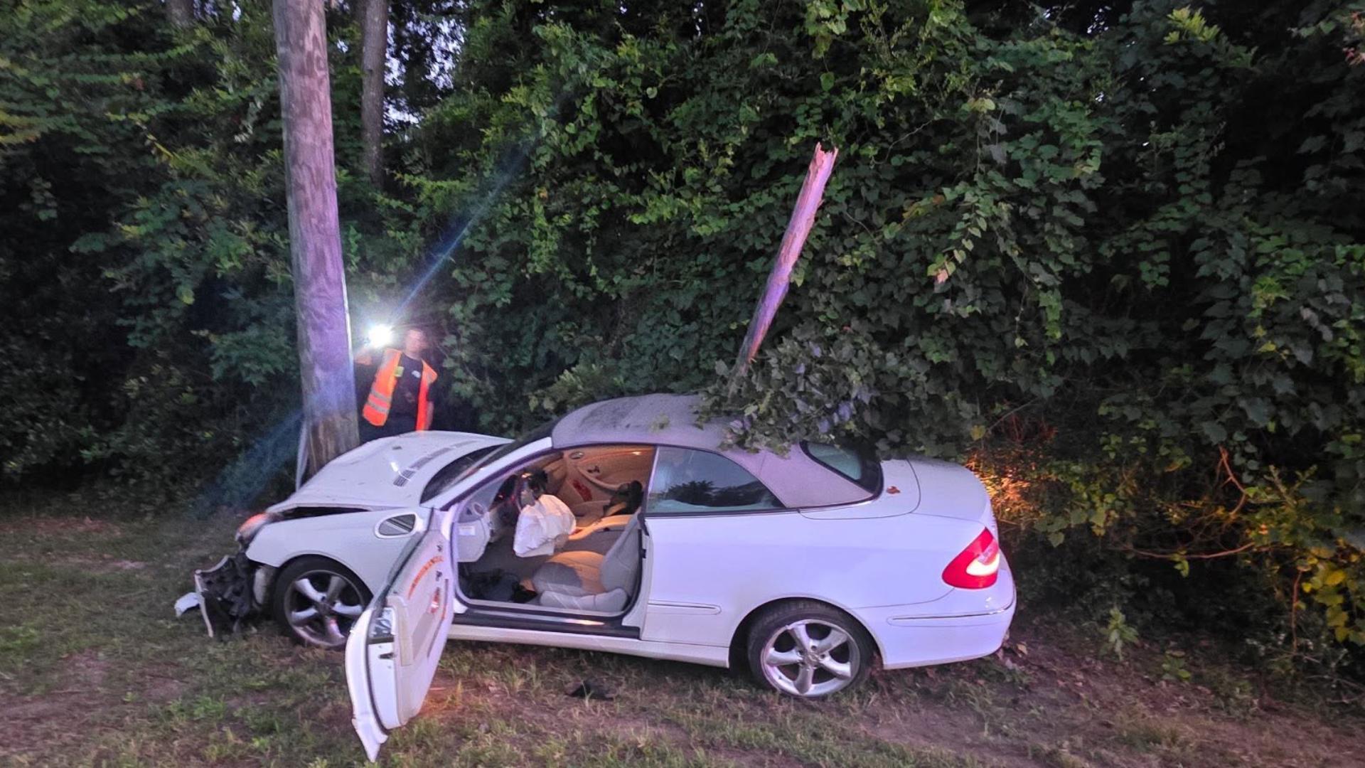 Driver hospitalized after vehicle crashes into utility pole in The ...