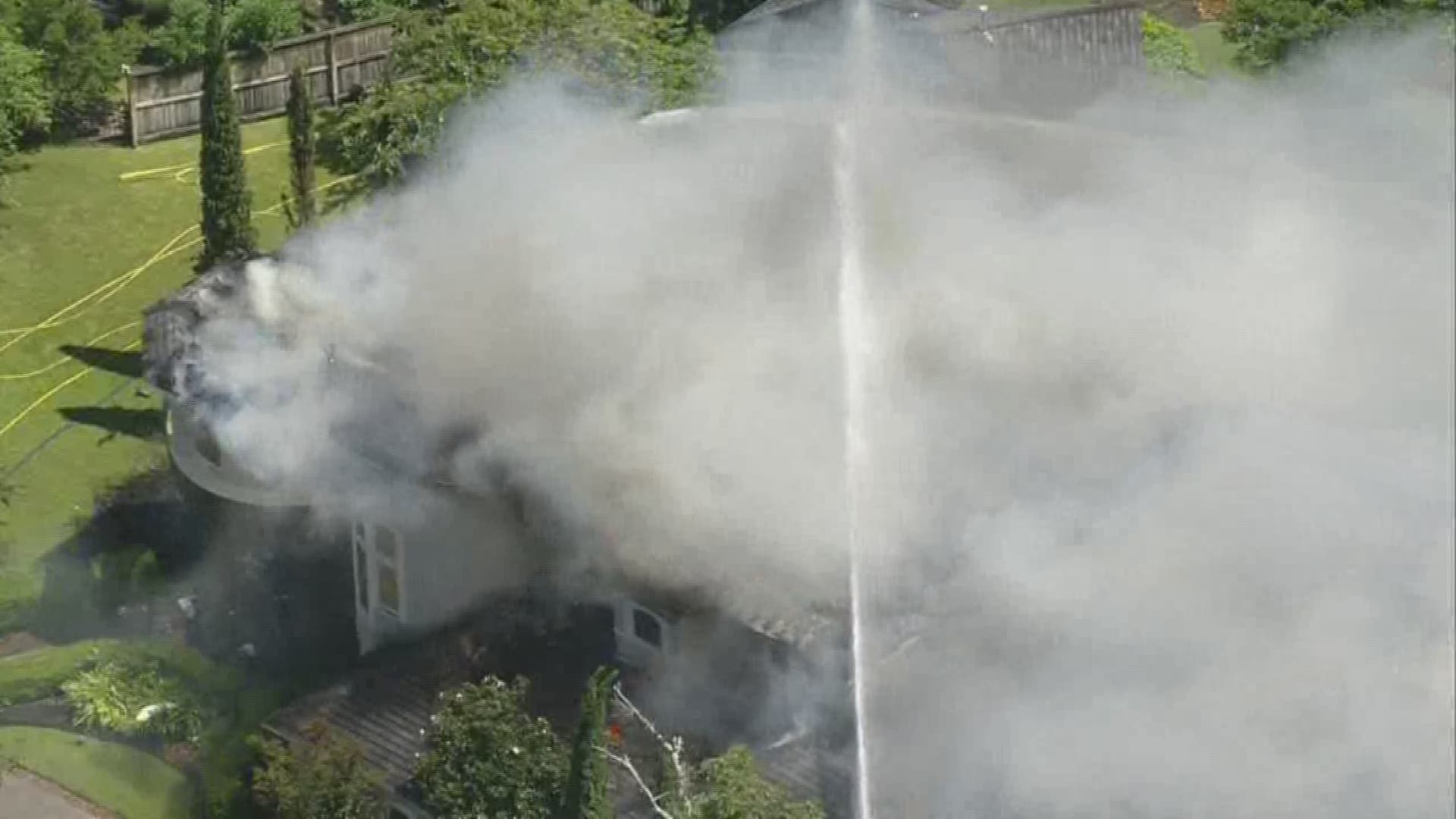 Crews battle 3alarm house fire in Spring