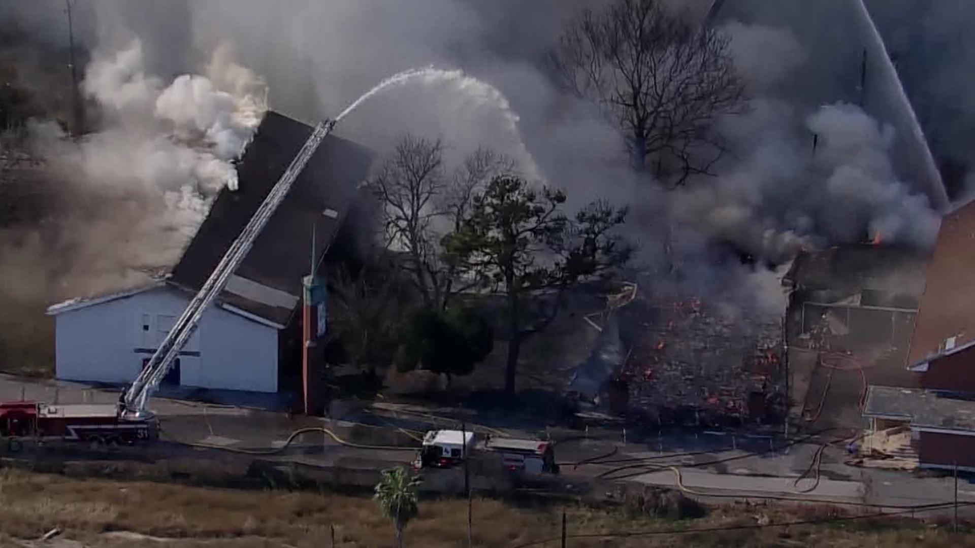 Three-alarm fire rips through former church buildings in north Houston ...