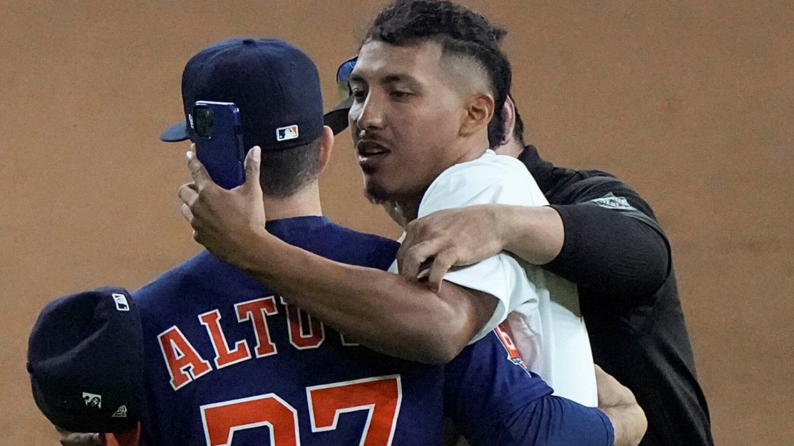 Houston Astros hero José Altuve hilariously hugs it out in viral fan moment  - CultureMap Houston