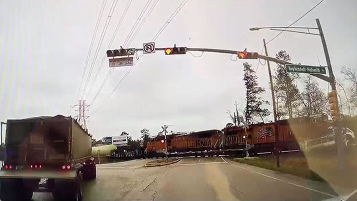 Photos: Train smashes into truck stuck on tracks in Spring | khou.com