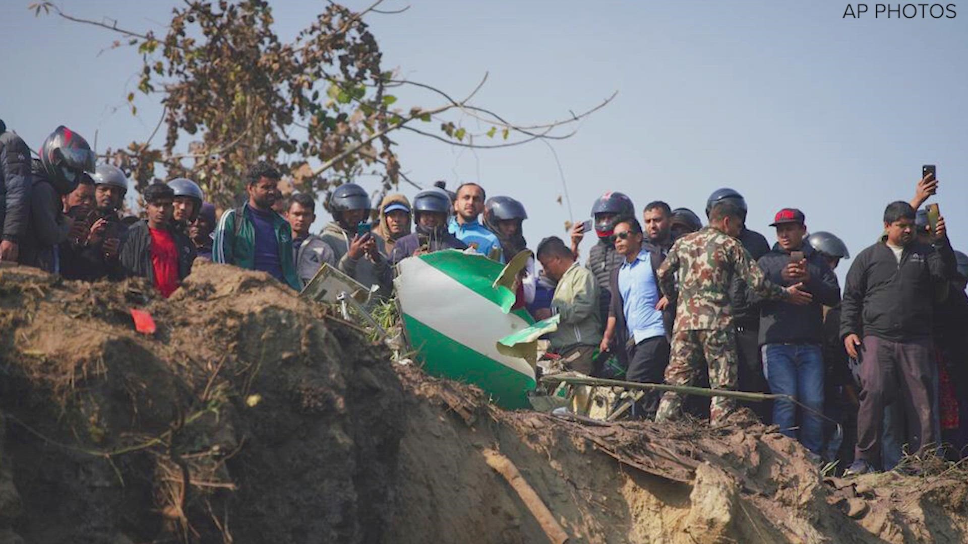 These still images show the wreckage in Nepal after a plane crashed in the Seti River Gorge near the city of Pokhara.