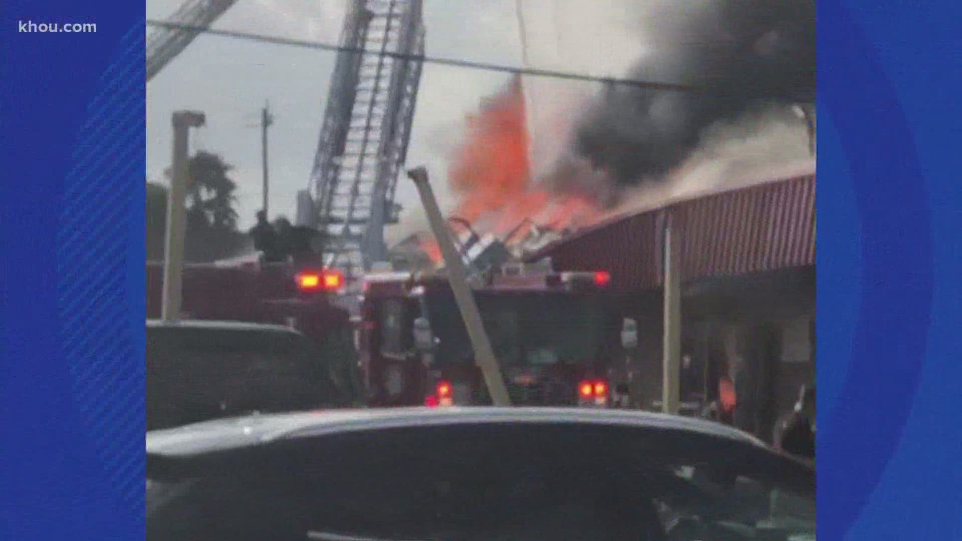 Houston firefighters battled a building fire a supermarket in southeast Houston Friday evening.
