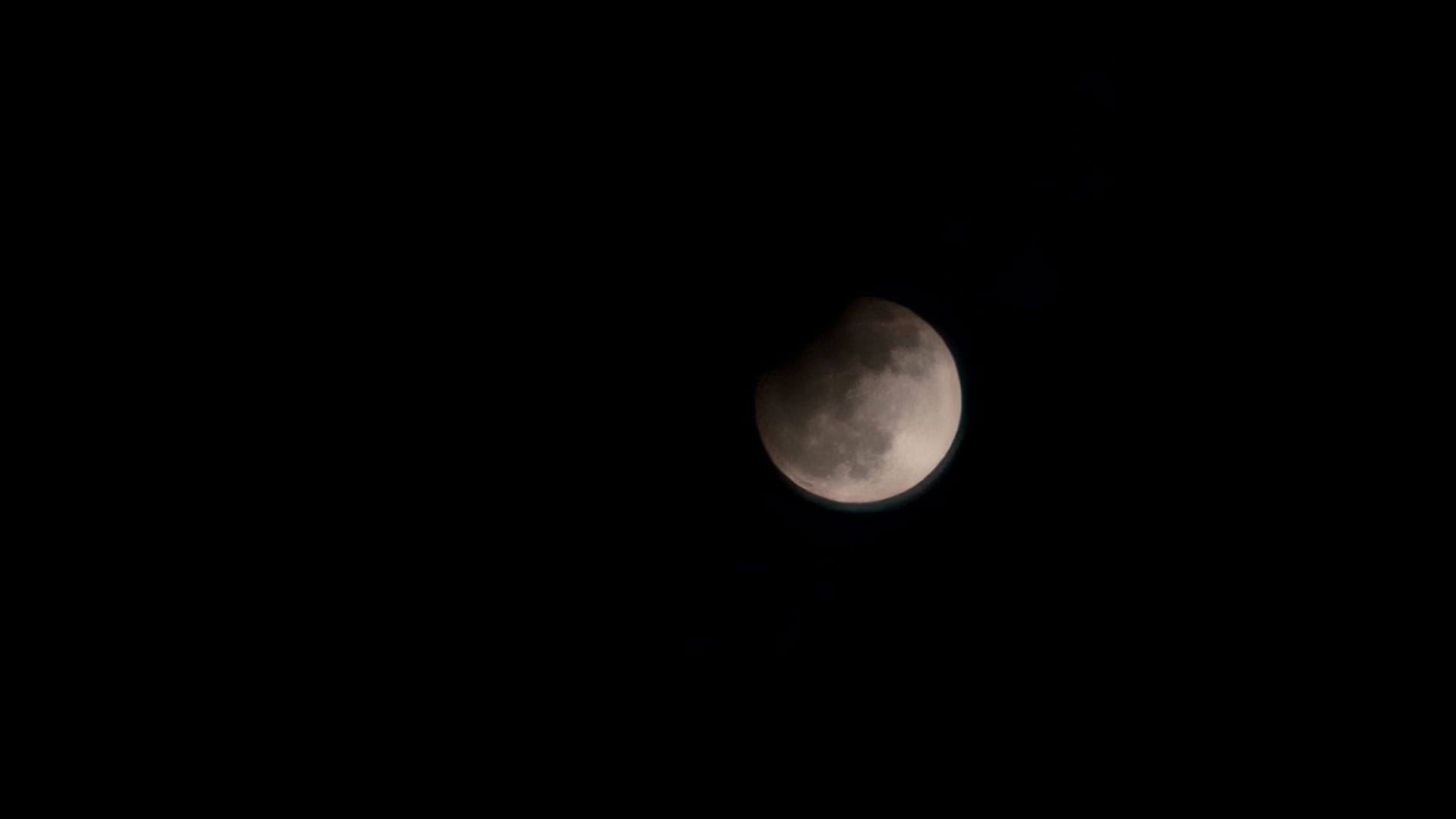 Super full harvest moon, partial lunar eclipse as seen in Houston ...