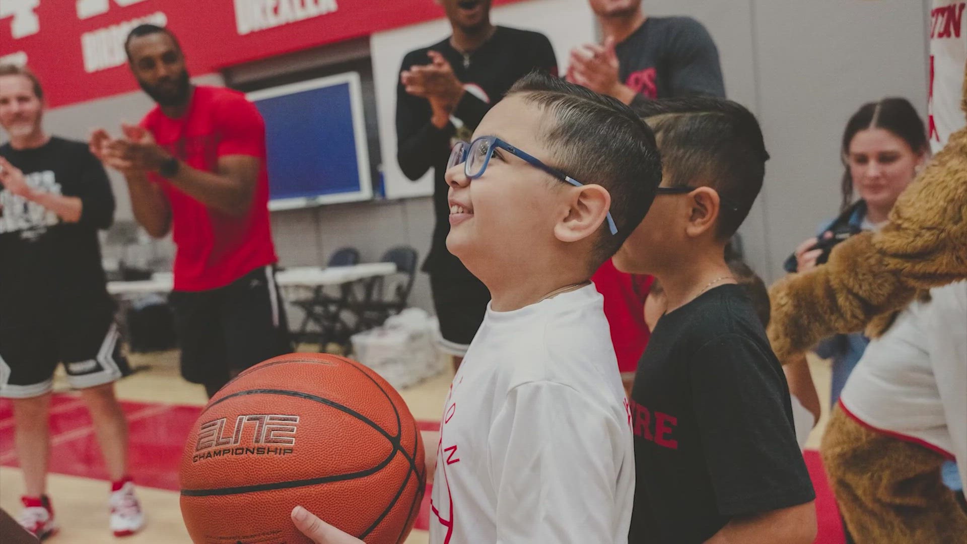 He may not stand that tall, but this 11-year-old who's battling lupus makes his mark on the UH basketball team.