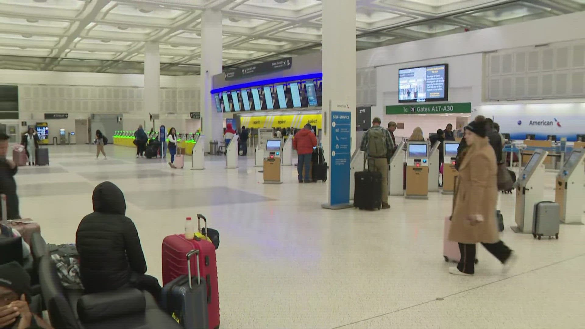 Airport officials are asking travelers to check their flight status frequently as freezing temps are still a concern.