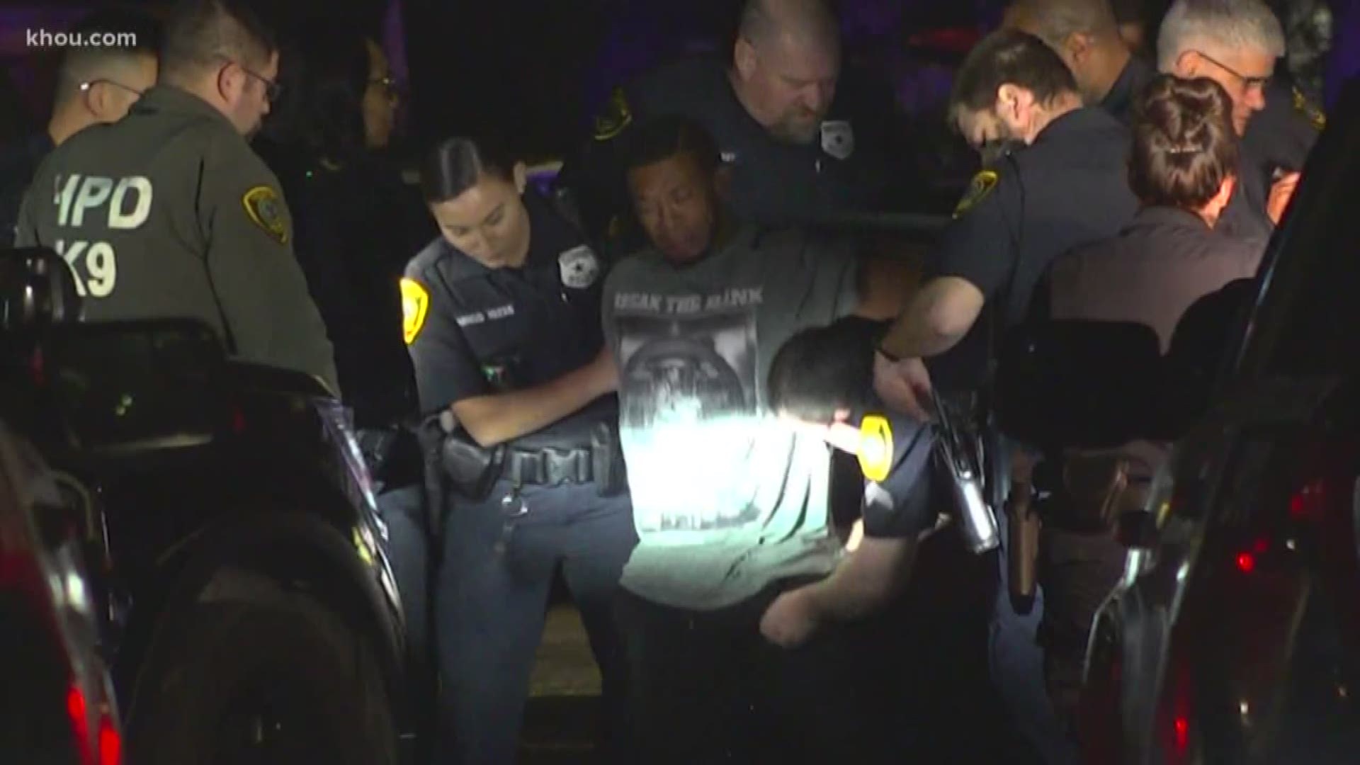 Man taken into custody after barricading himself inside stolen car ...