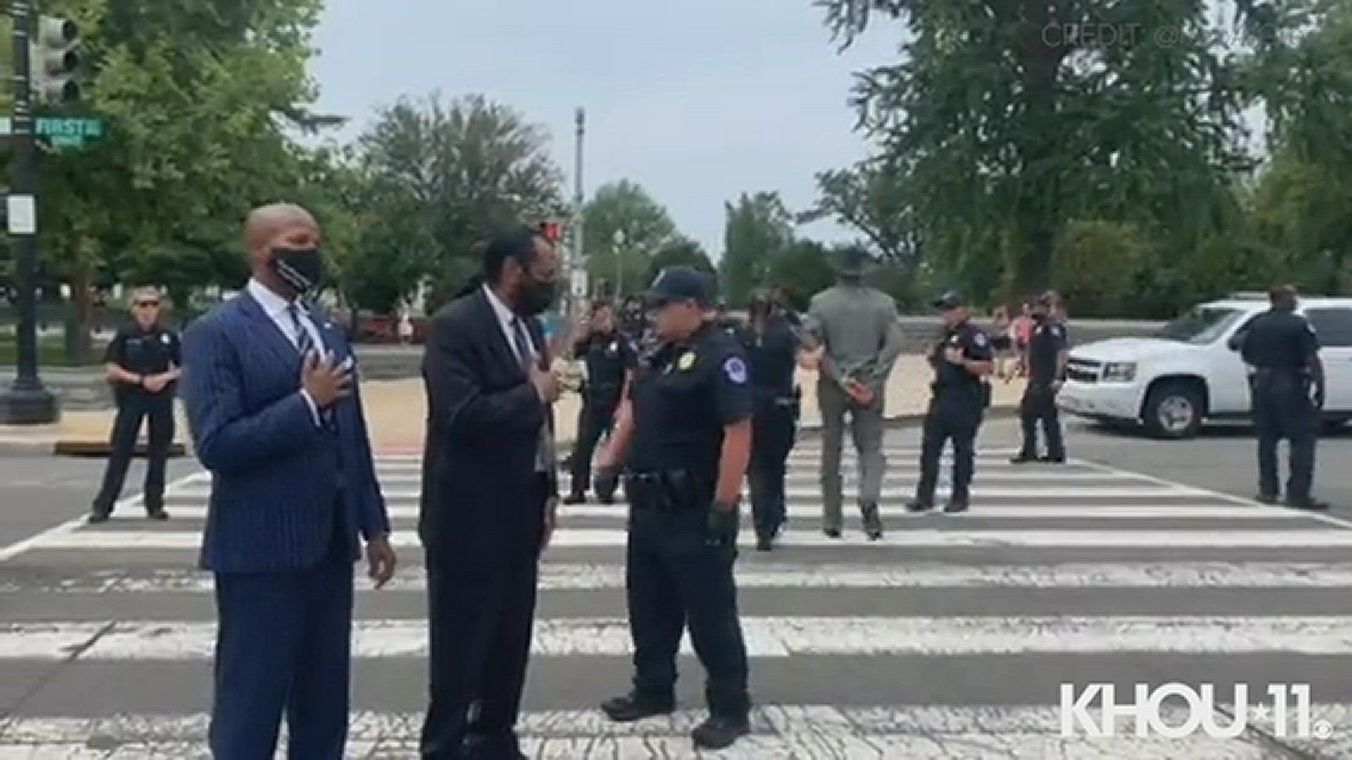 Rep. Al Green posted this video to Twitter showing his arrest in Washington, D.C. on Tuesday, Aug. 3, 2021. He and others were protesting against voting legislation.