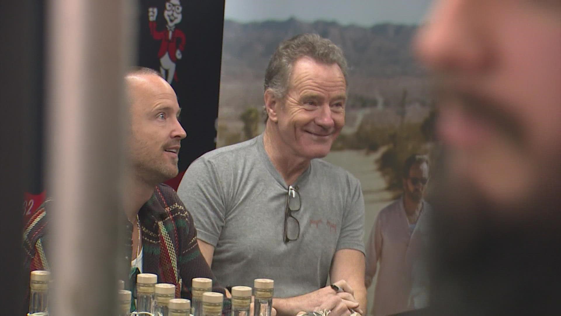 This time Brian Cranston and Aaron Paul are cooking up mezcal and hundreds of lucky fans waited in line at Spec's to get their bottles signed.