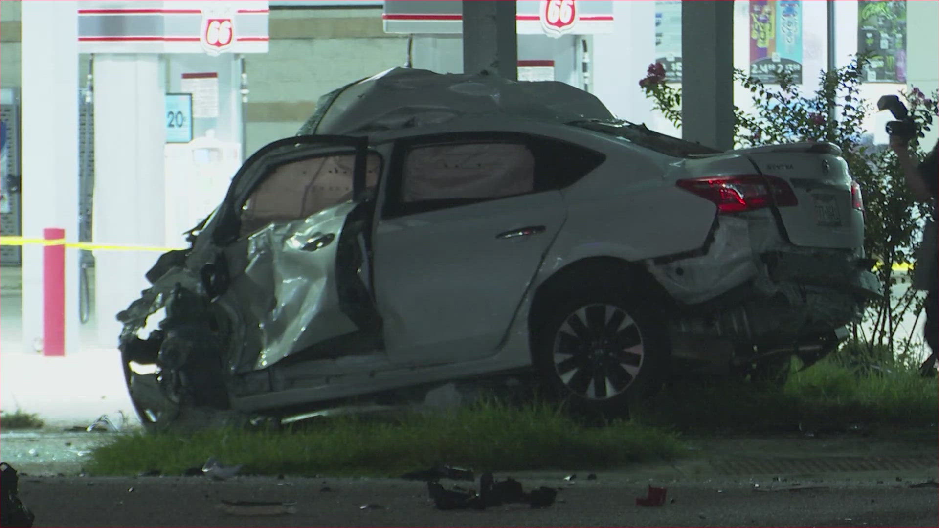 A driver died after police say he ran a red light and slammed into another car with an Uber driver and family inside early Tuesday morning.