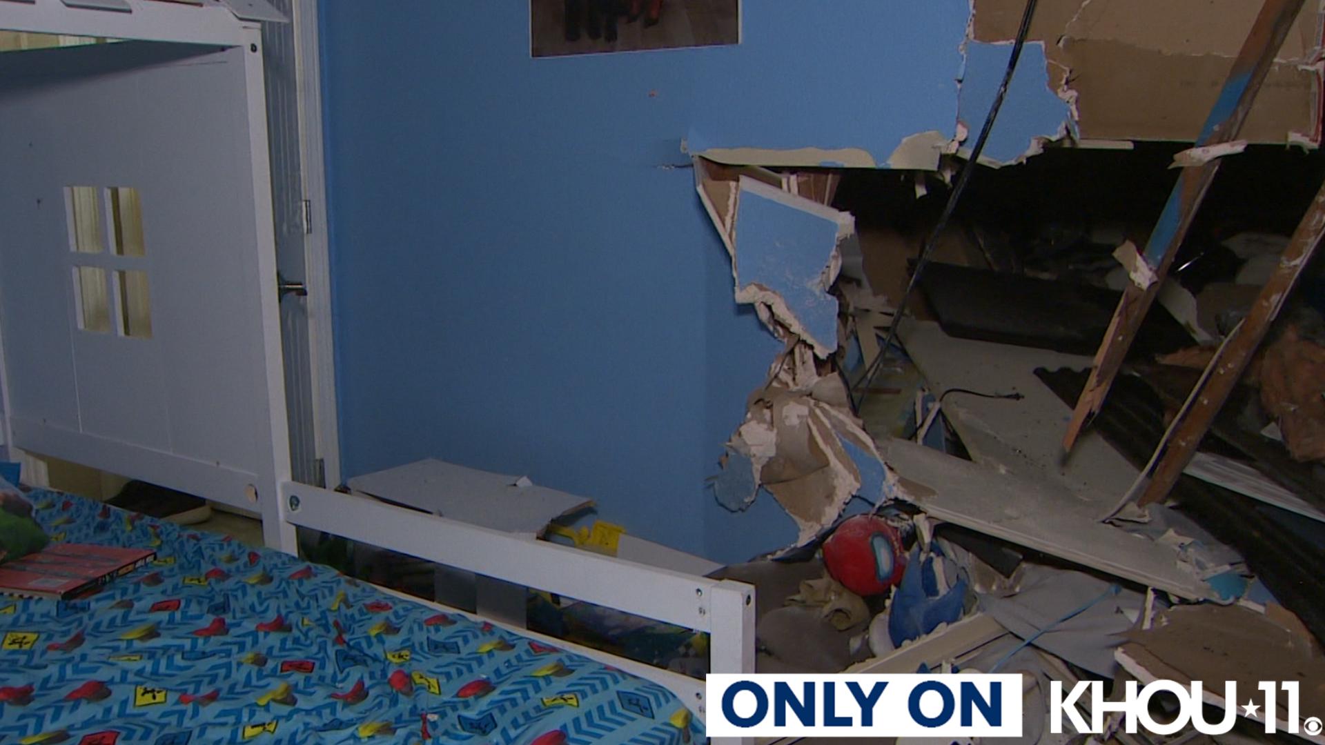 Glass, toys and books are still scattered all around the room, but a family picture with Hope Ngmuezi’s wife in it is still on the wall next to the boys' beds.