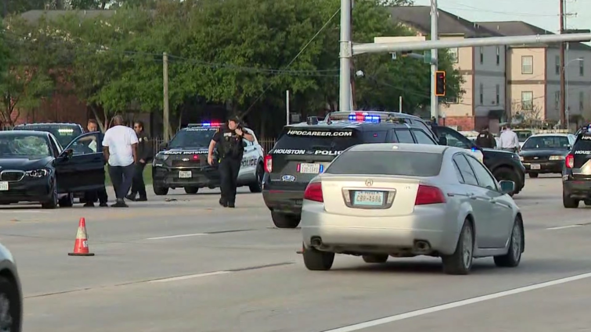 The driver of a black BMW tried to swerve and avoid hitting the victim. He stayed at the scene and won't face charges, HPD said.