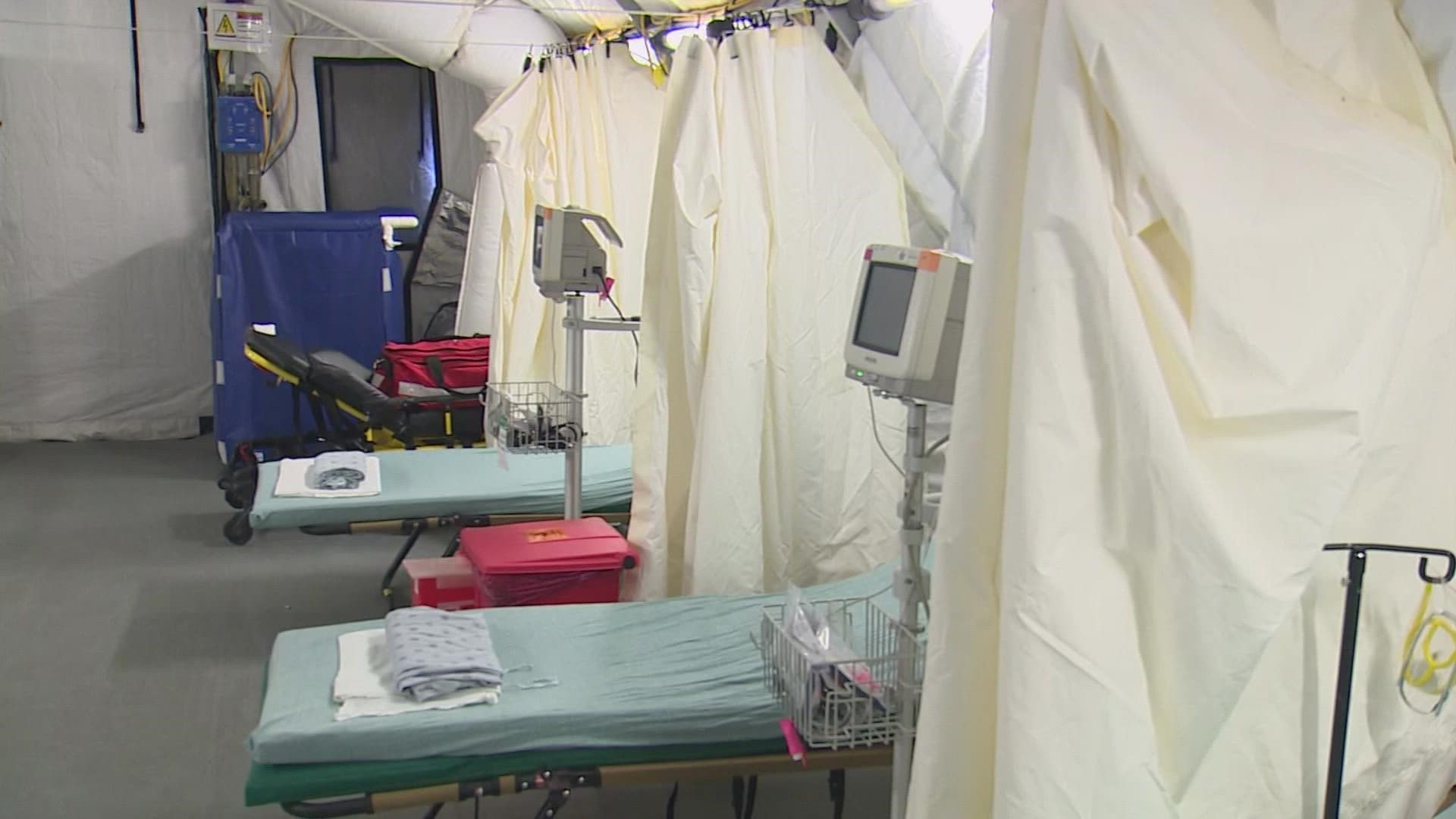 Medical tents outside of Lyndon B. Johnson Hospital are ready to accept COVID-19 patients immediately, but the beds are empty because there are not enough nurses.