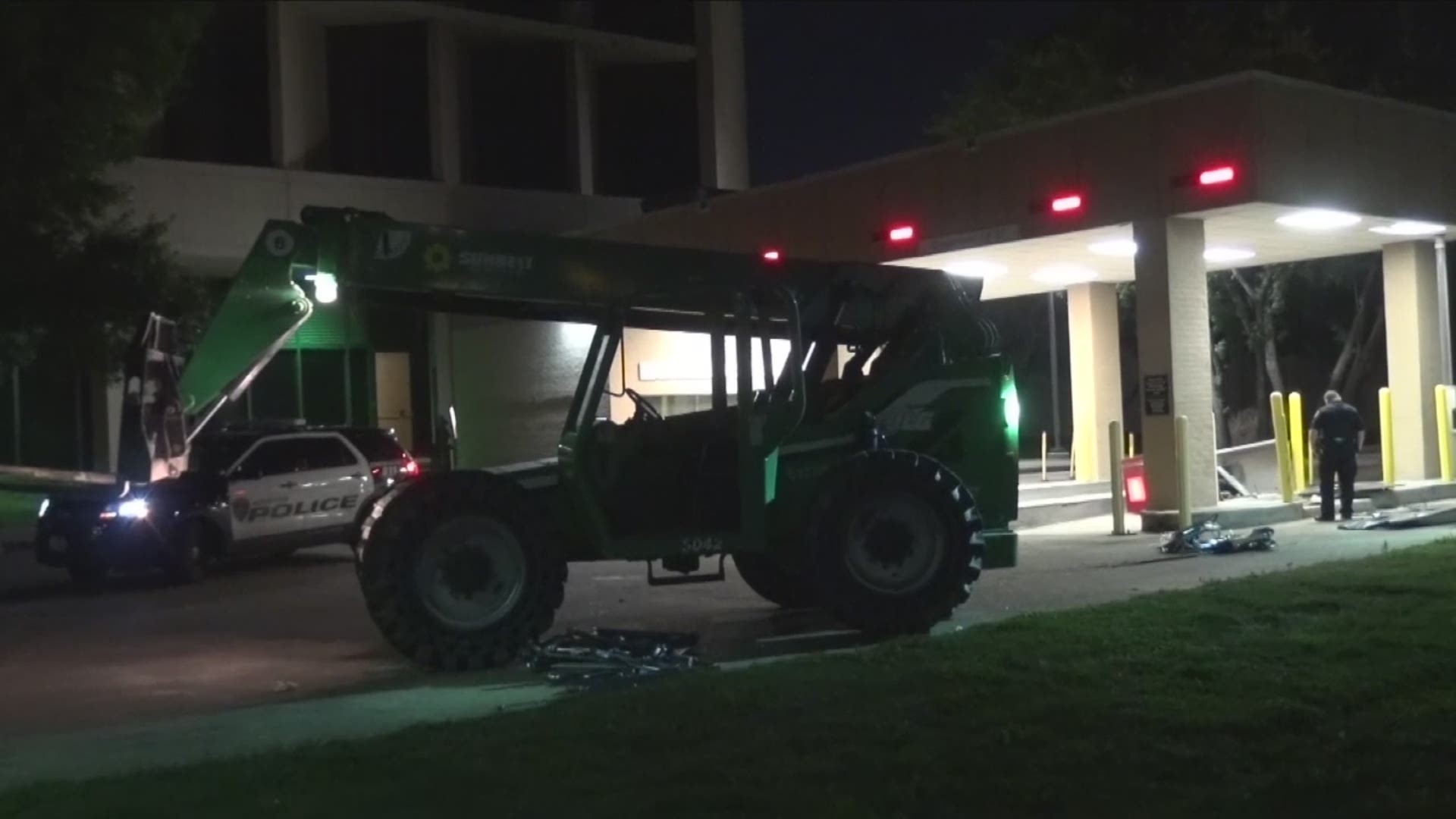 Police are searching for a pair of suspects who they say used a forklift to smash an ATM and steal the cashbox inside early Wednesday.