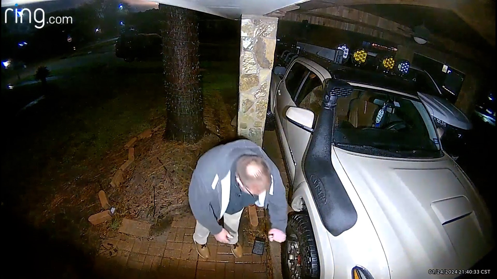 Raw video: Man seen stabbing tires in Deer Park home's driveway, police ...