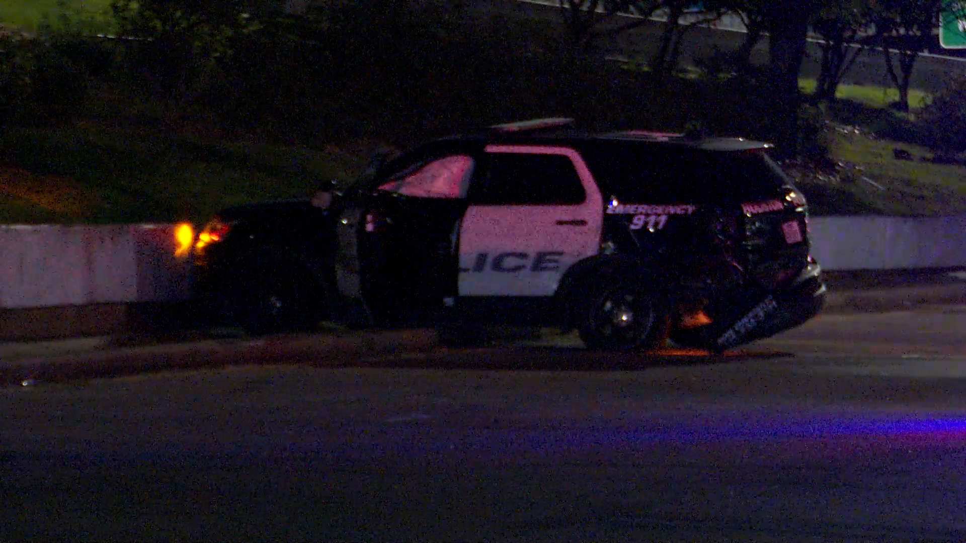 An officer was taken to a hospital Thursday night after an SUV crashed into her patrol car while she was responding to a scene, HPD said.