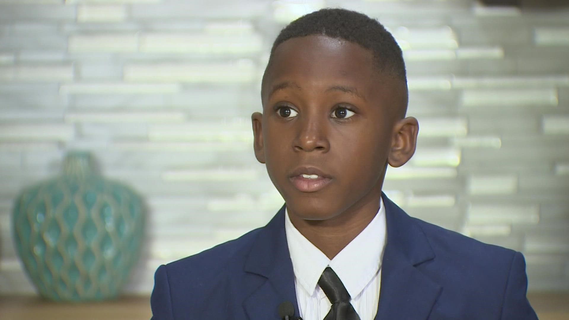 “We are not where we should be, but thank God we are not where we used to be,” 10-year-old Ronnie Williams said during his speech.