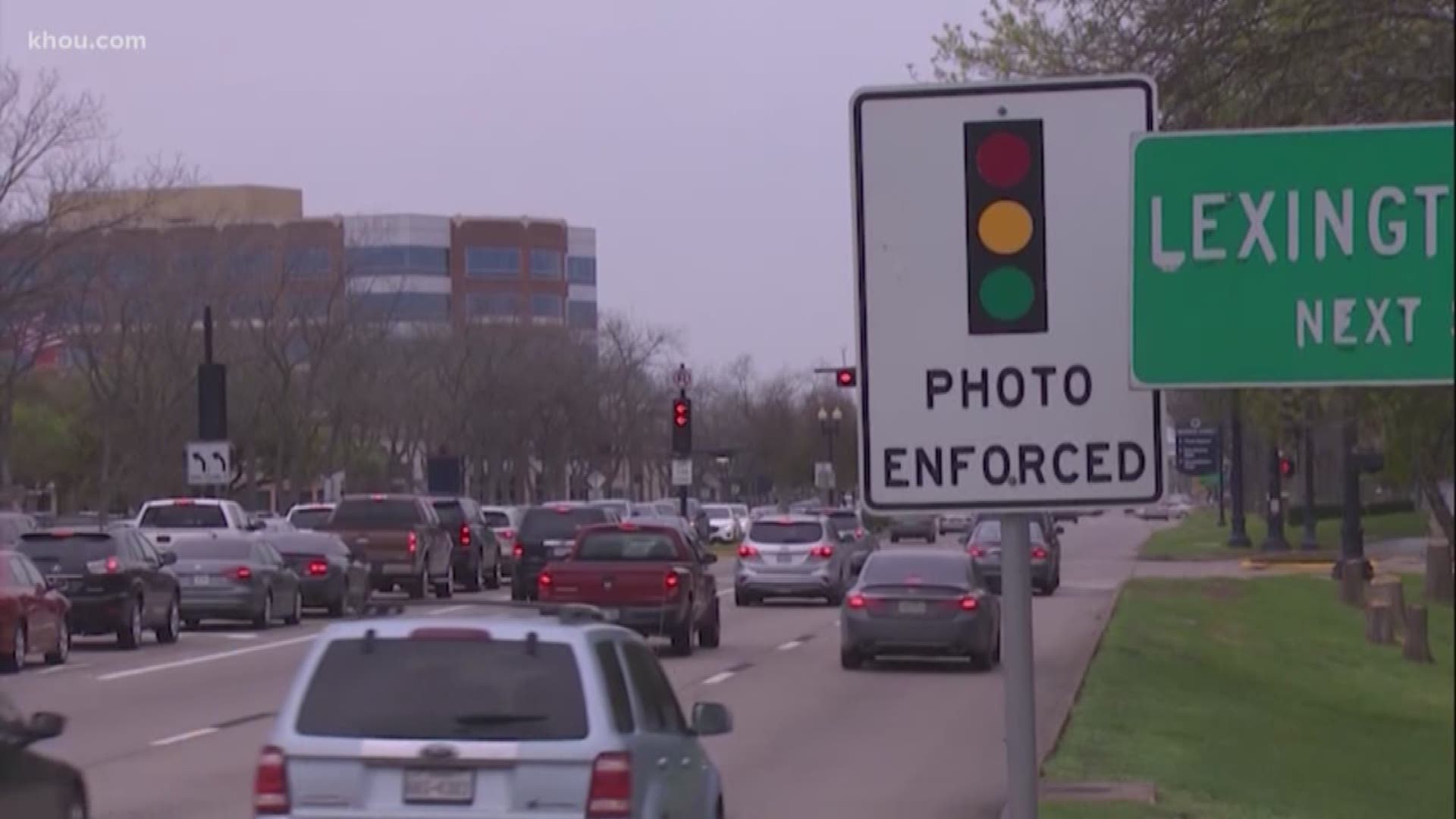 Texas Gov. Greg Abbott signed a bill Saturday banning red light cameras in the state. Abbott posted a video to Twitter showing his signature.