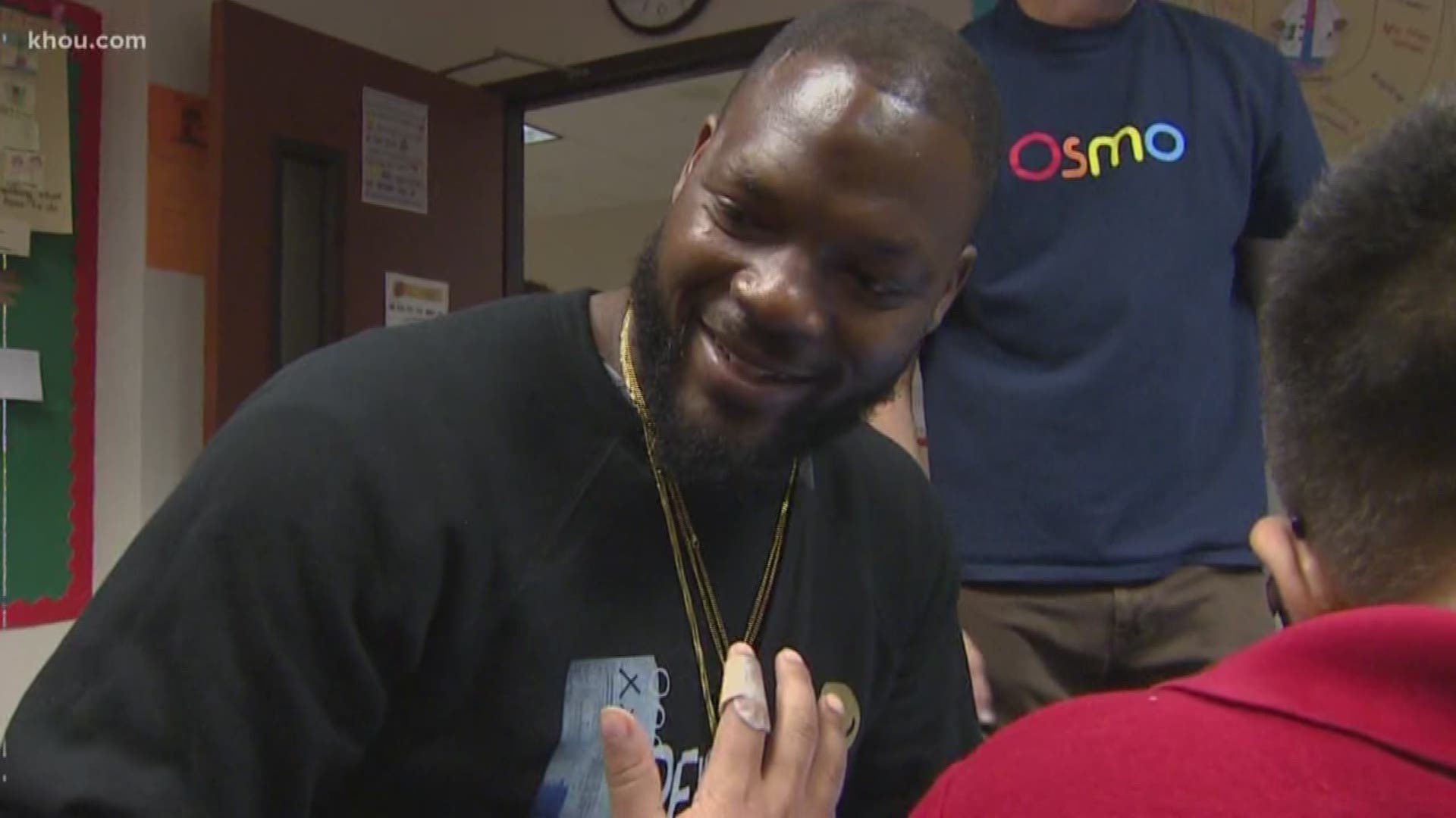Former NFL Pro Bowl tight end Martellus Bennett was back at his old elementary school in Alief visiting kids in a kindergarten class. He's helping them combine physical and digital play to learn how to deal with words and math topics.