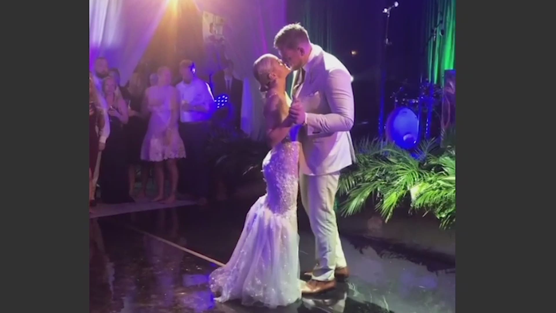 JJ Watt and Kealia Ohai are seen dancing at their wedding in the Bahamas on Feb. 15, 2020. The video was recorded by Amber Brooks.