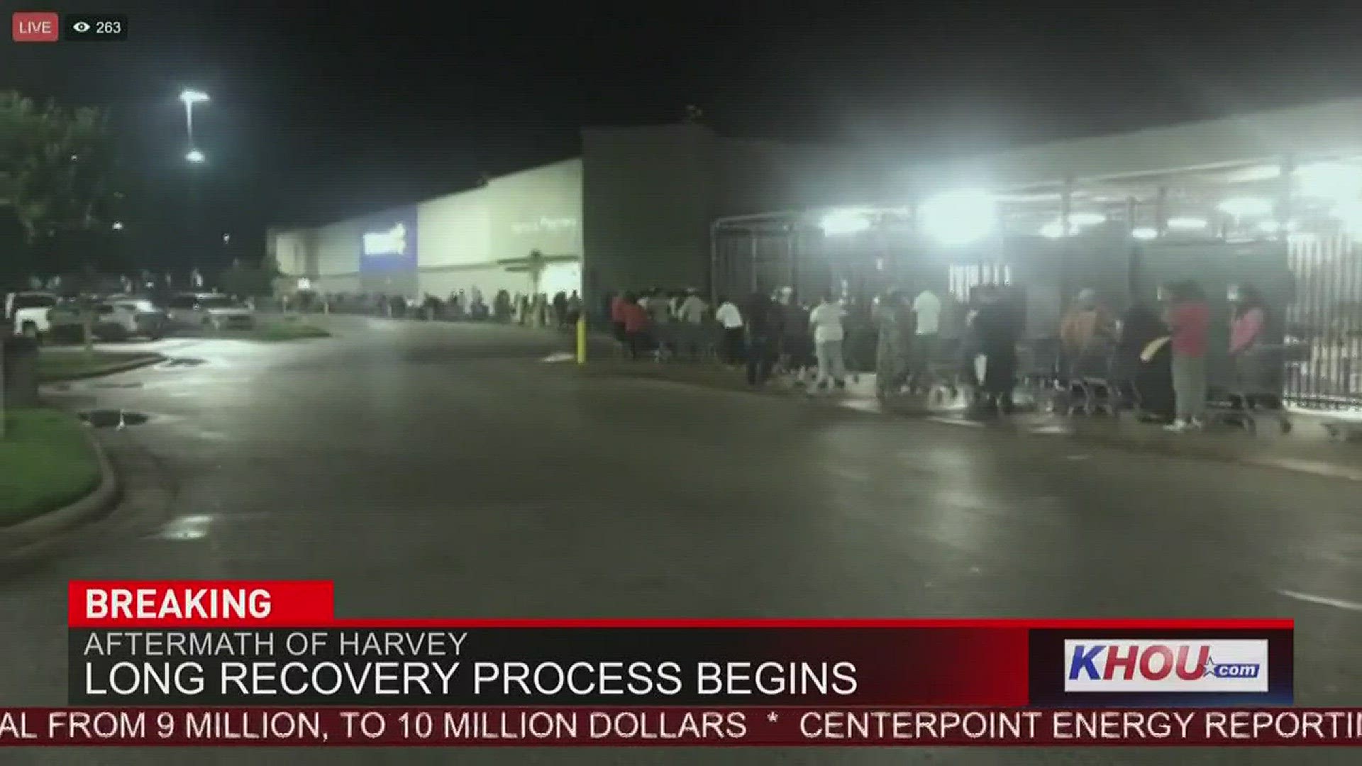 People waiting to buy water at Beaumont Walmart