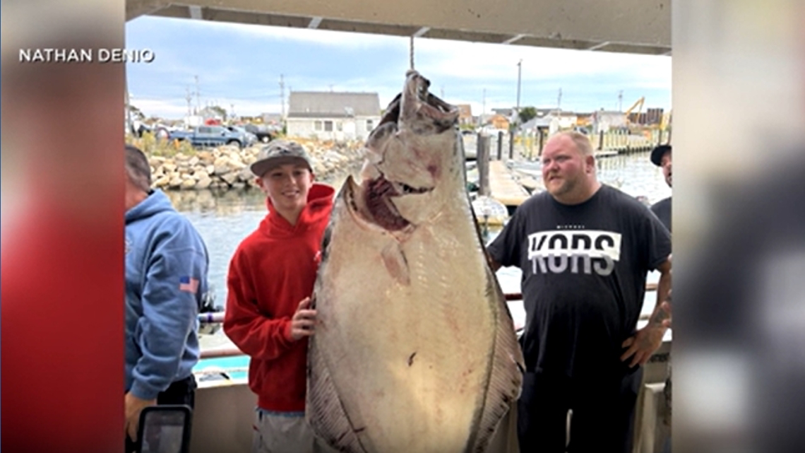Kid catches 177-pound halibut on deep sea fishing trip | Video