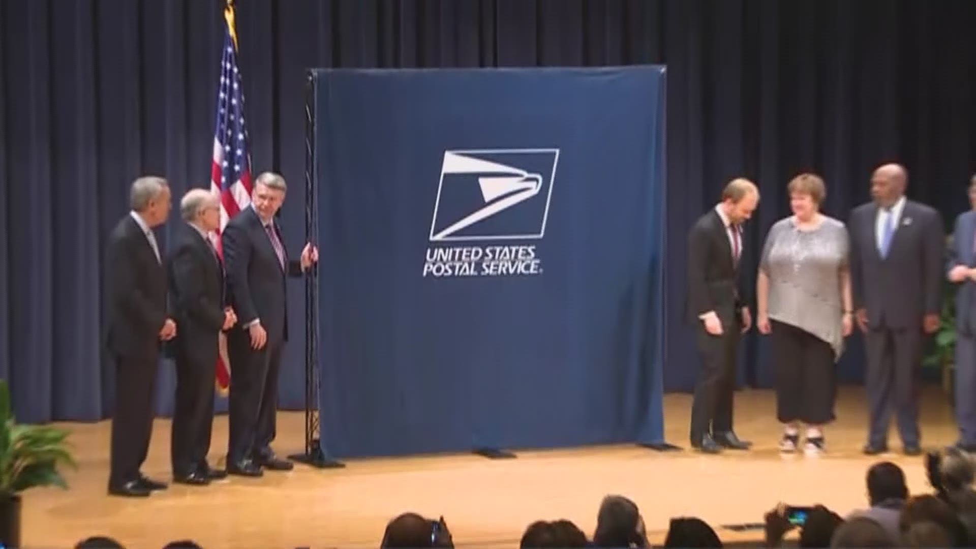 The U.S. Postal Service held a ceremony to unveil their forever stamp honoring former President George H.W Bush at the Bush Center in College Station.