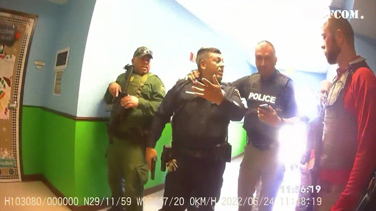 'She says she's shot': Body camera shows police restraining officer married to teacher who died