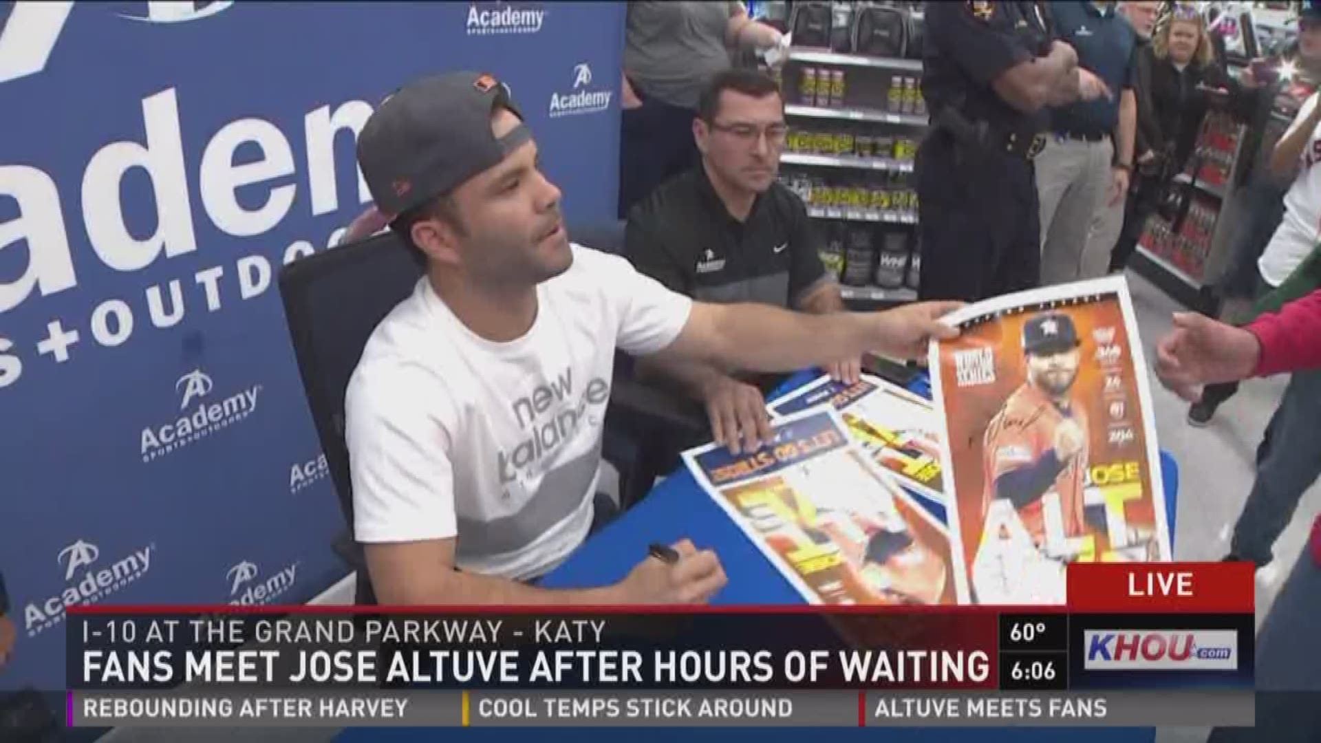 Fans wait in long lines at Academy stores to buy Astros' gear