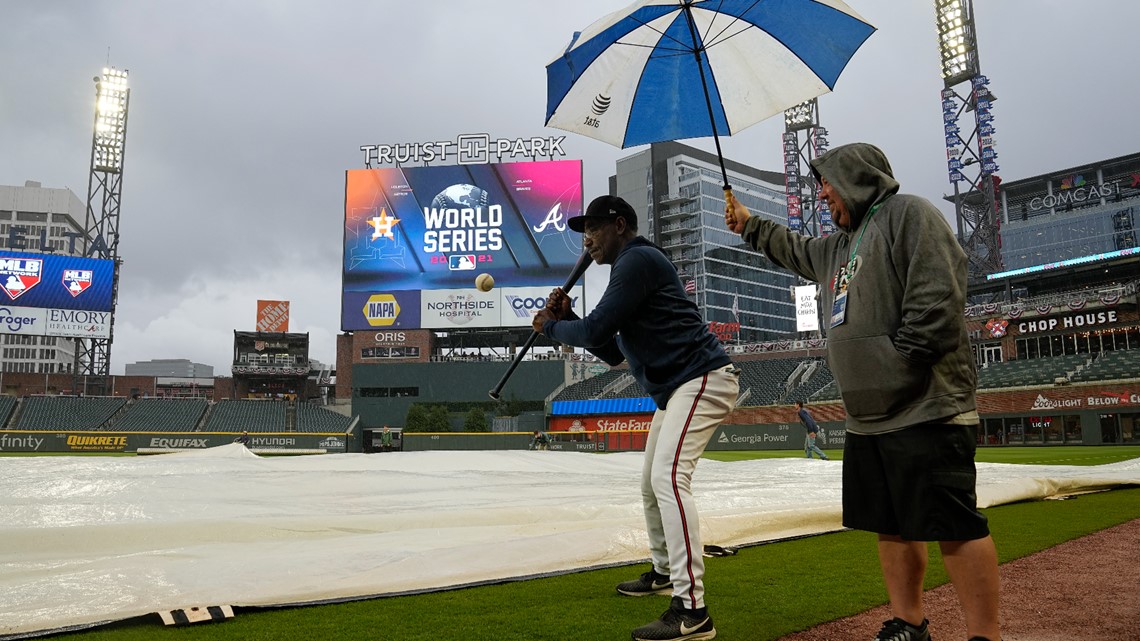 Wearing his umbrella hat, Blooper decided to take a dugout nap during the  Mets-Braves rain delay