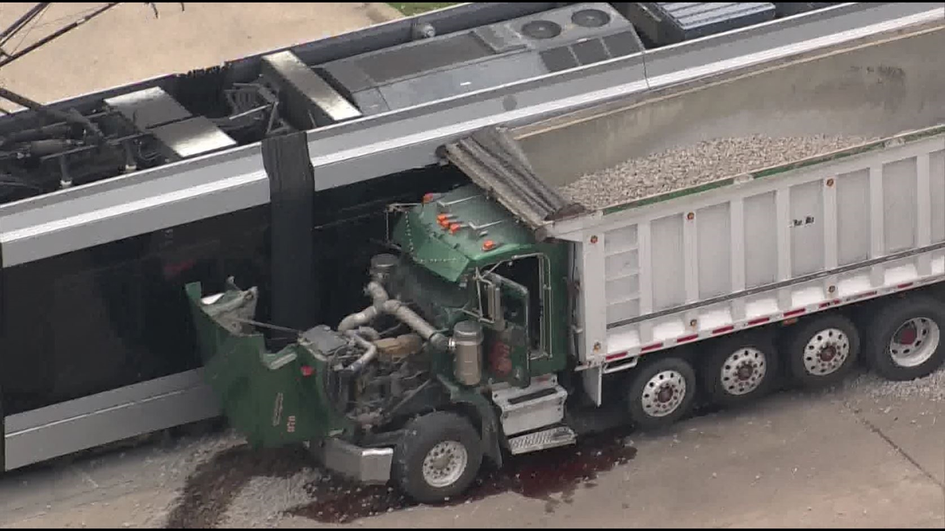 3 injured in crash involving METRORail Red Line and dump truck | khou.com