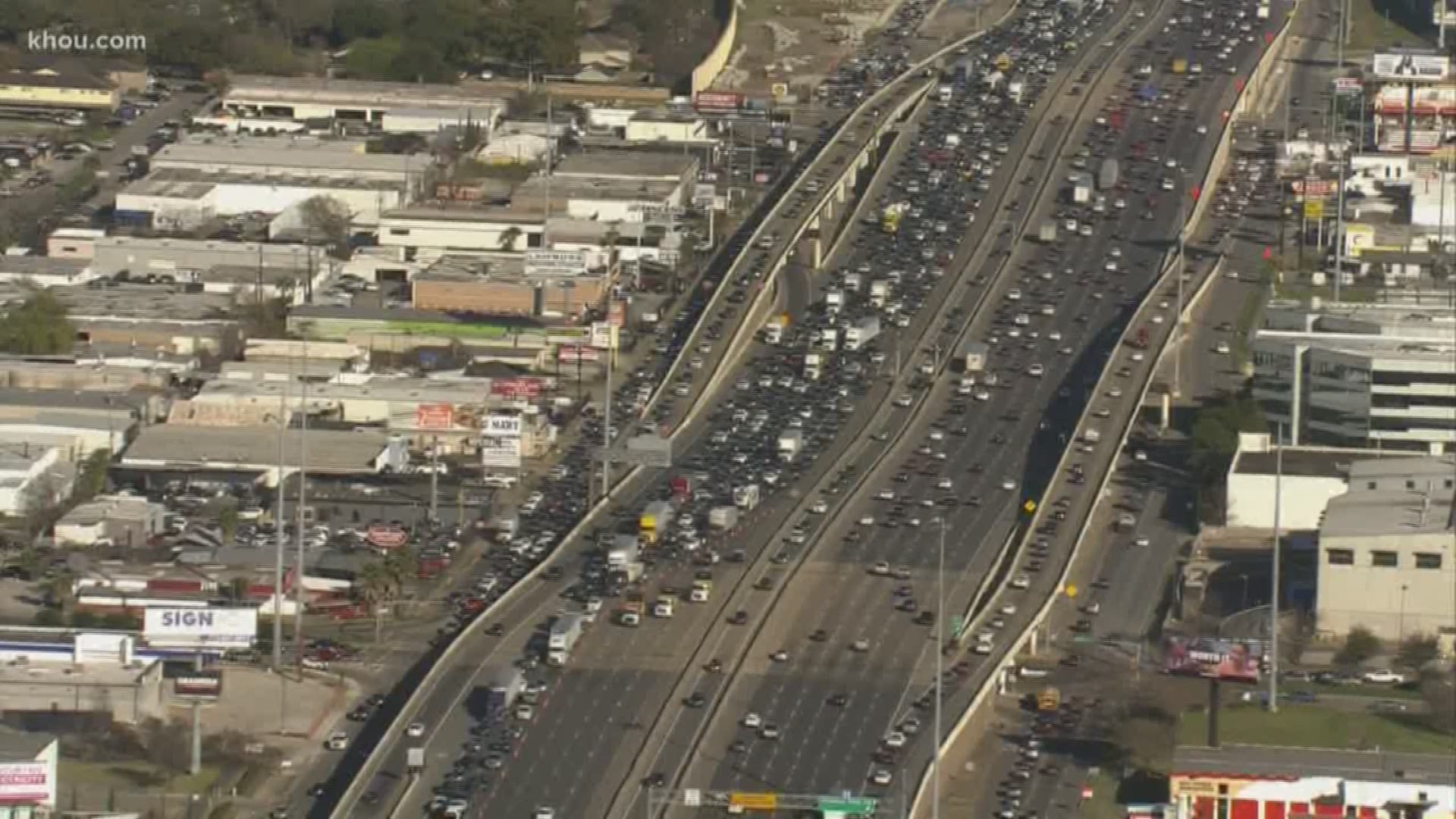 All southbound lanes of the Southwest Freeway at Harwin Drive are closed, causing a traffic backup for miles.