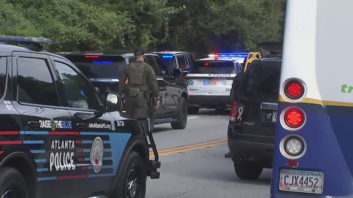 Georgia police officer killed, suspect dead in shooting outside CDC ...