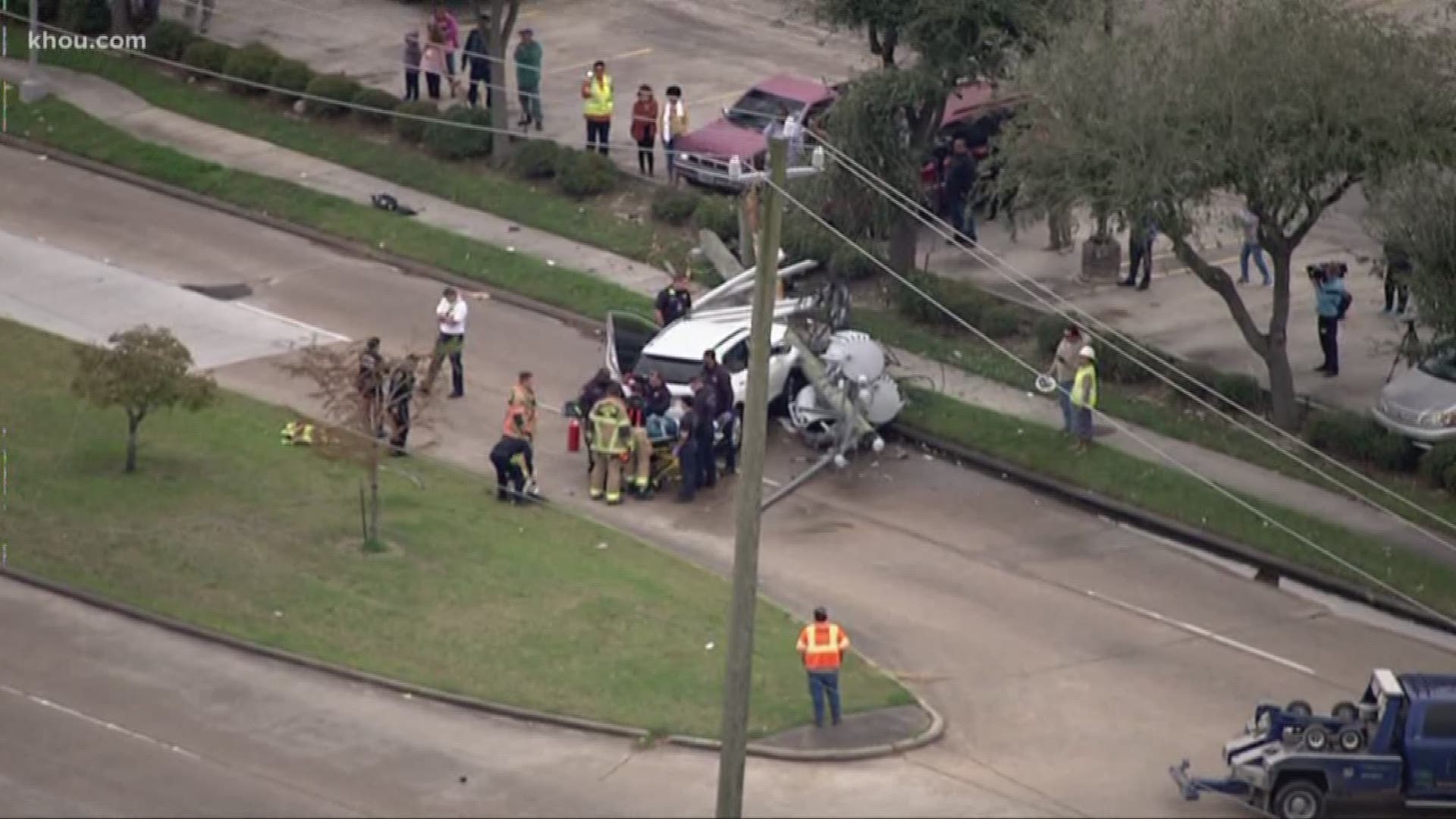 An SUV crashed into a utility pole Friday in southwest Houston.