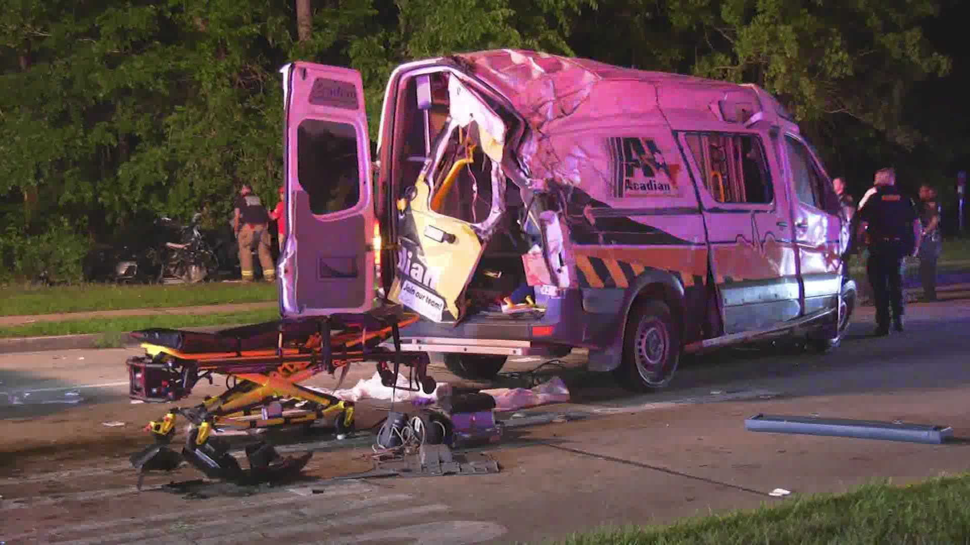 A woman is dead and four others were hospitalized late Friday night after a rollover crash involving a private ambulance in north Harris County.