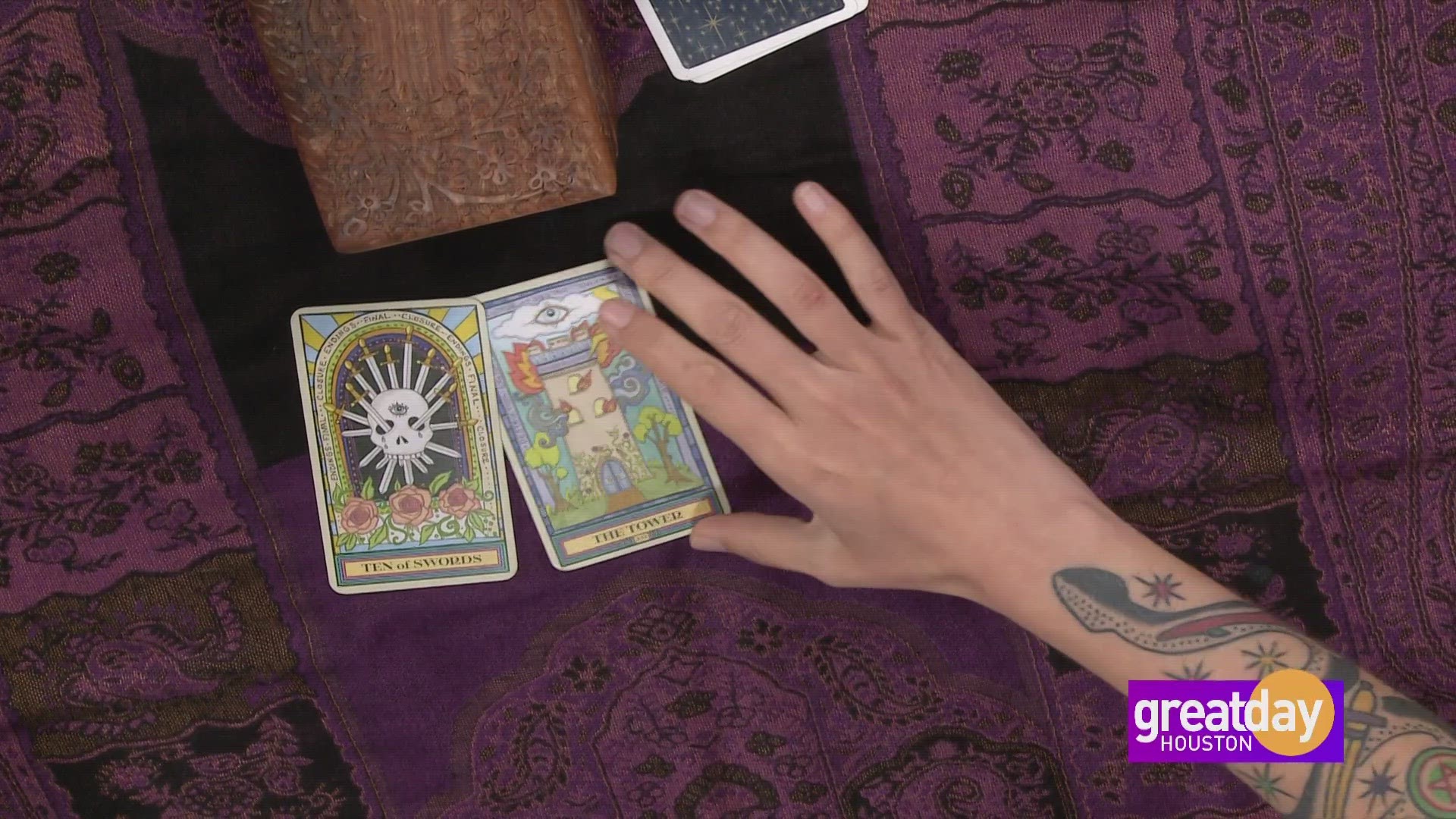Tarot Practitioner, Amber Ambrose, shares the meaning behind tarot card reading and how it helps you to pause and think through your next steps.