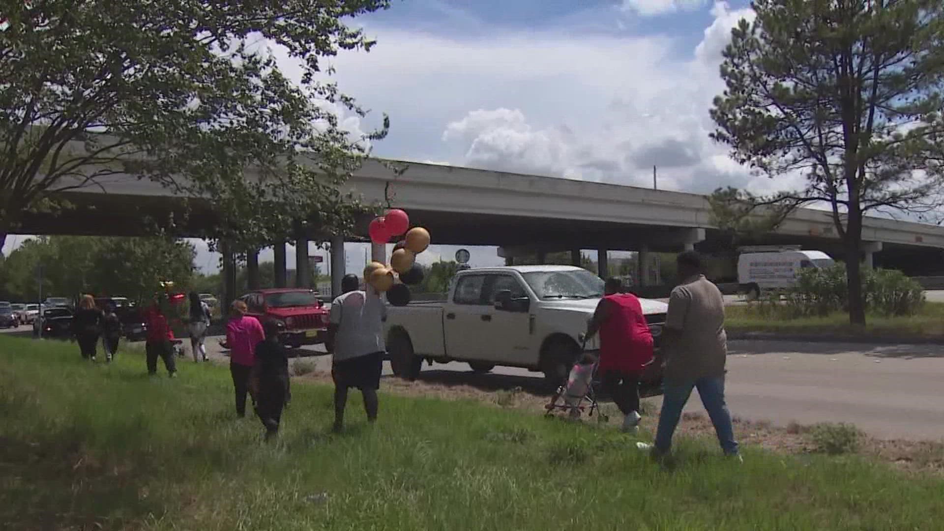 The family of the man killed in a horrific accident on the North Freeway this week held a vigil Saturday at the location where the father of five died.