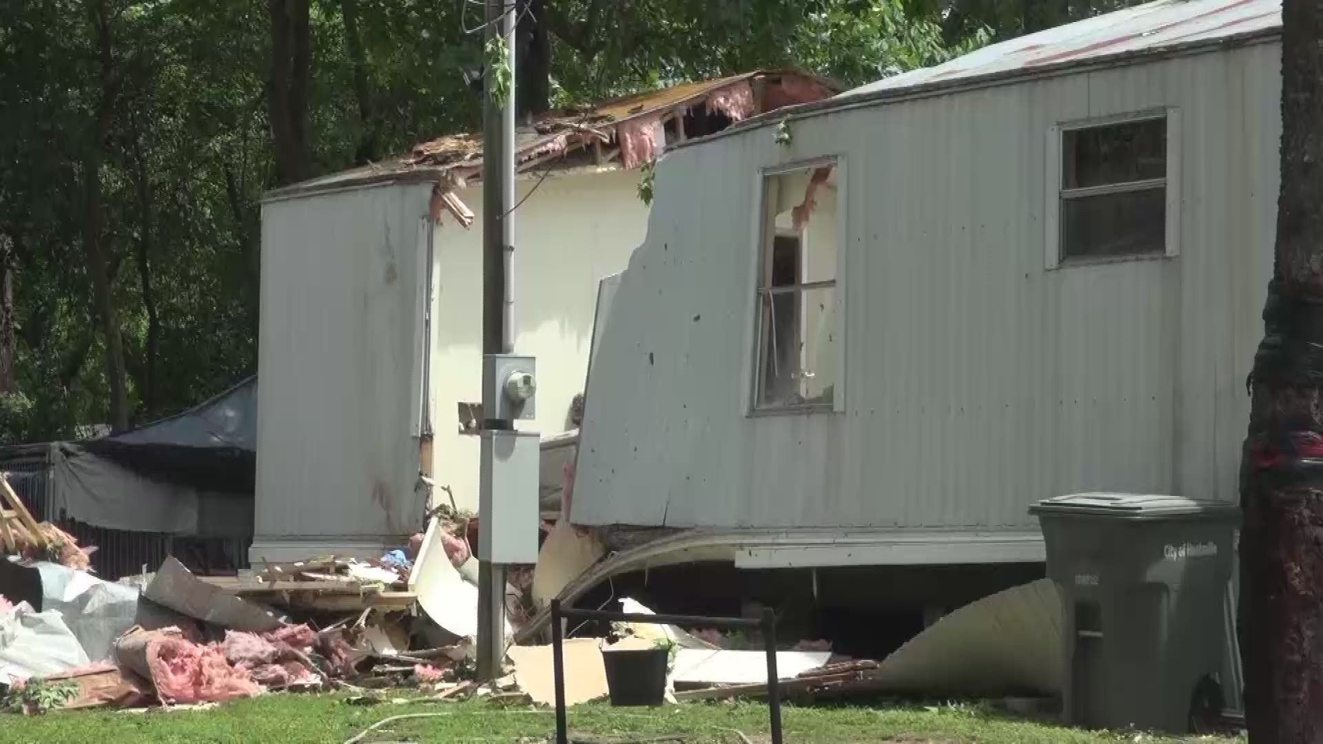 The tree split the man's mobile home in half.