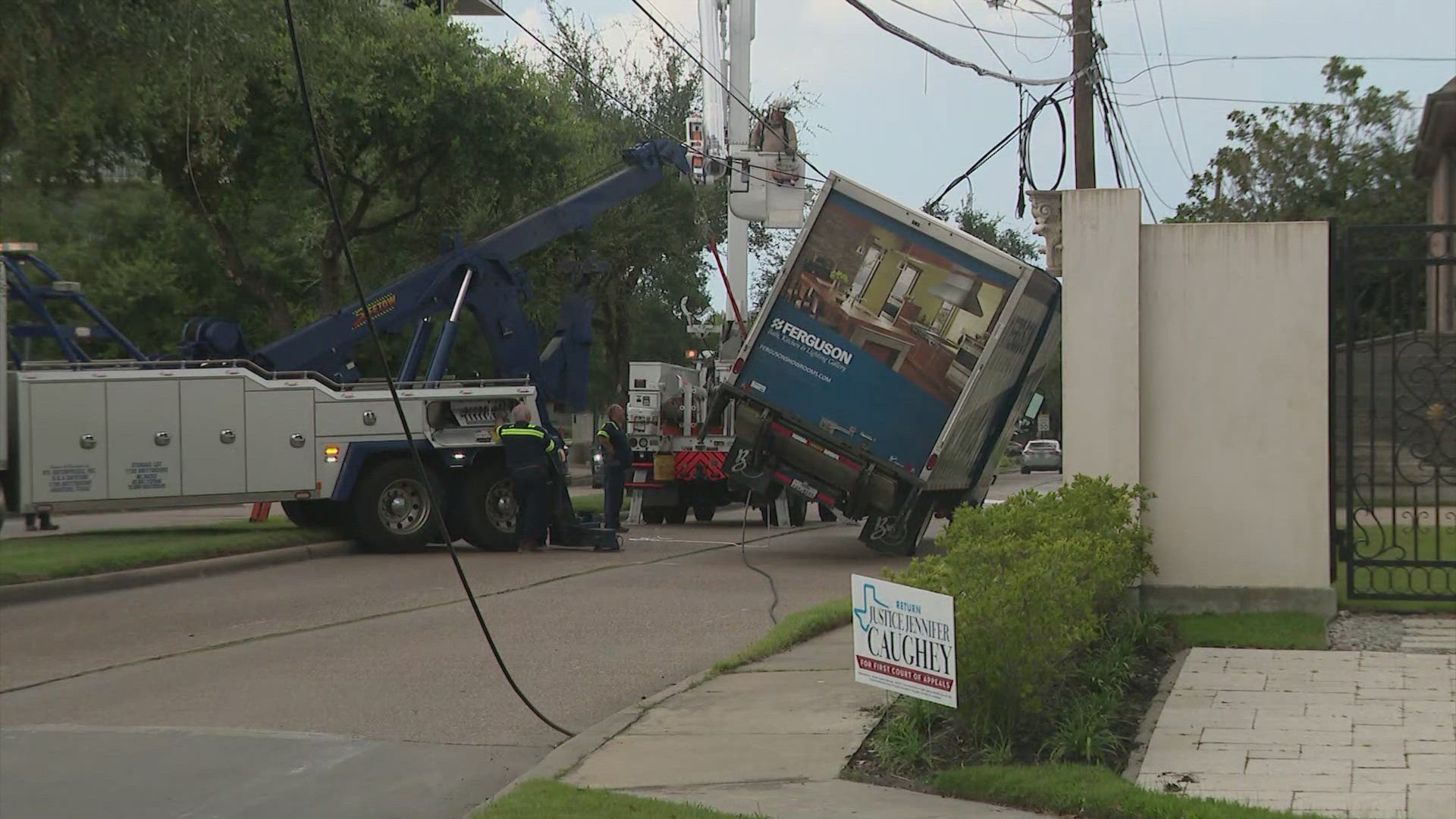 No injuries were reported when a delivery truck got tangled up in some utility wires on Willowick near Westheimer.