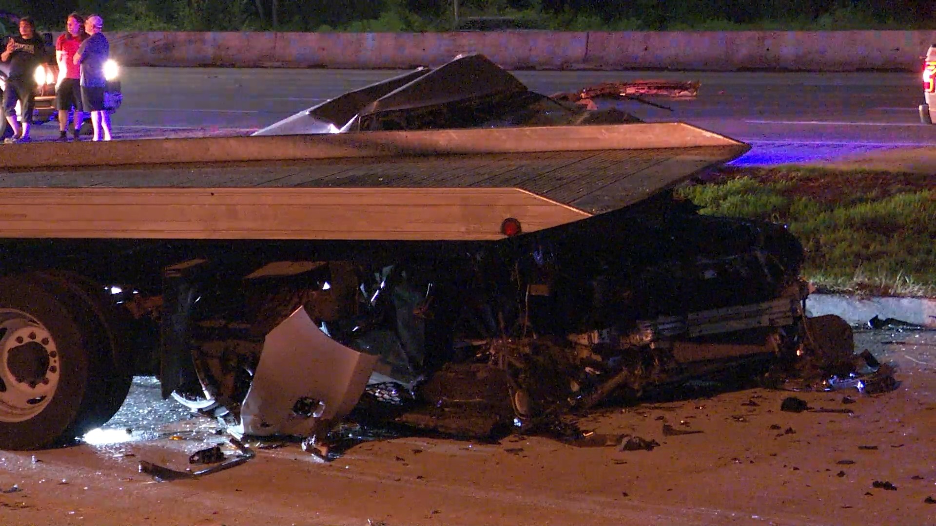 At least one person was killed in a crash involving a tow truck along the North Freeway Friday morning, according to Harris County Sheriff Ed Gonzalez.