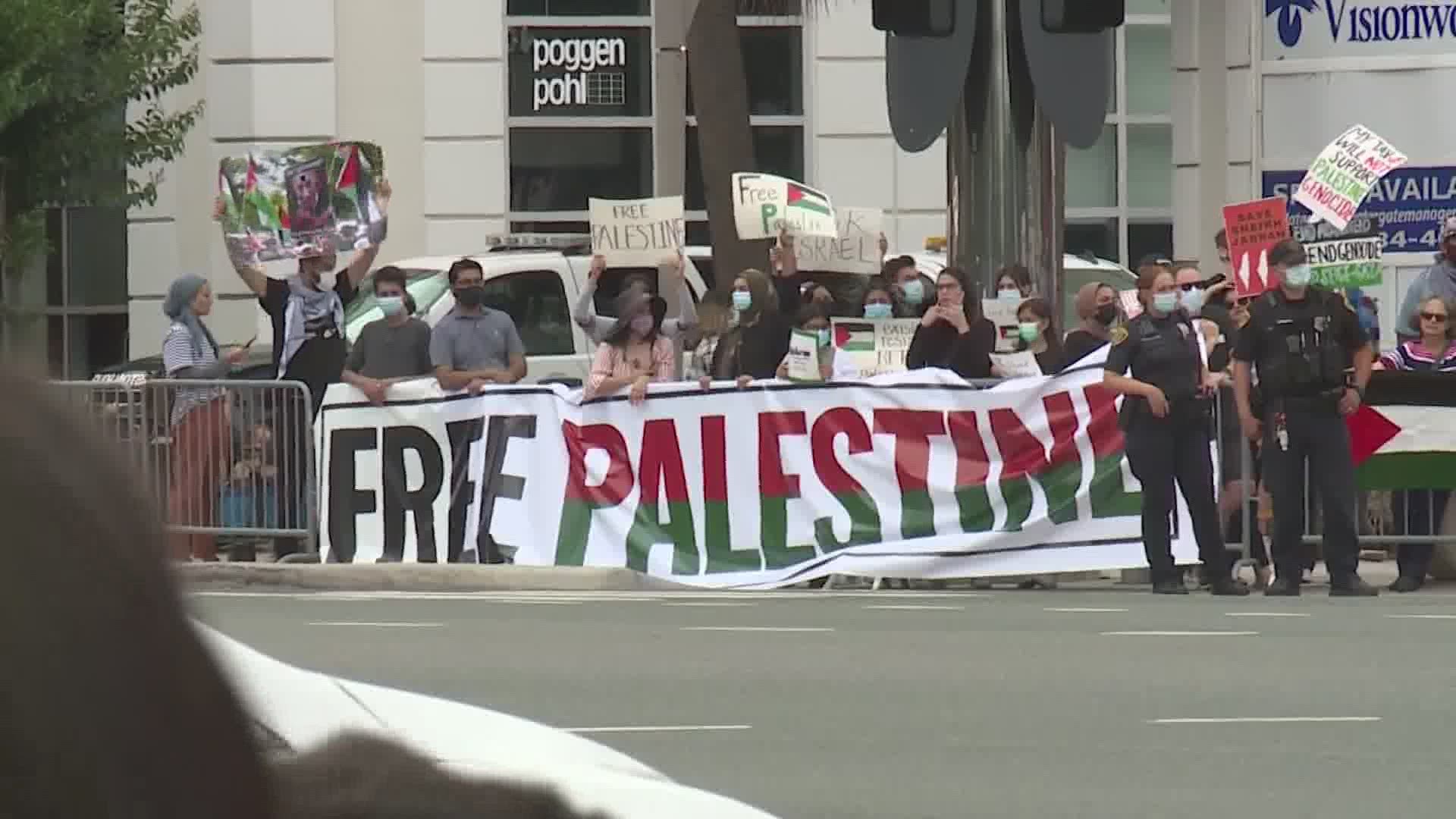 Dozens of people gathered Saturday near Westheimer and Post Oak Boulevard to show solidary with Palestine, organizers said.