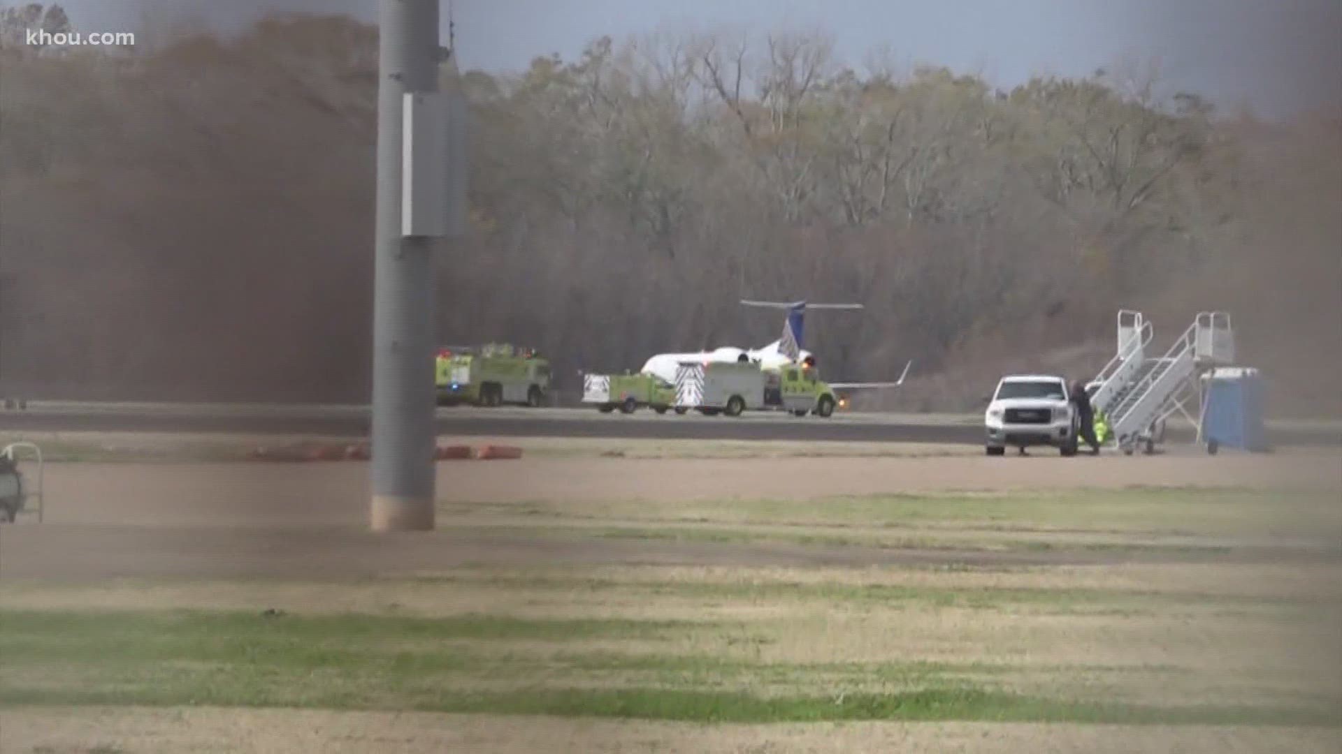 A plane heading from Jackson, Miss. to Houston made an unscheduled stop Wednesday after a report of explosives on board.