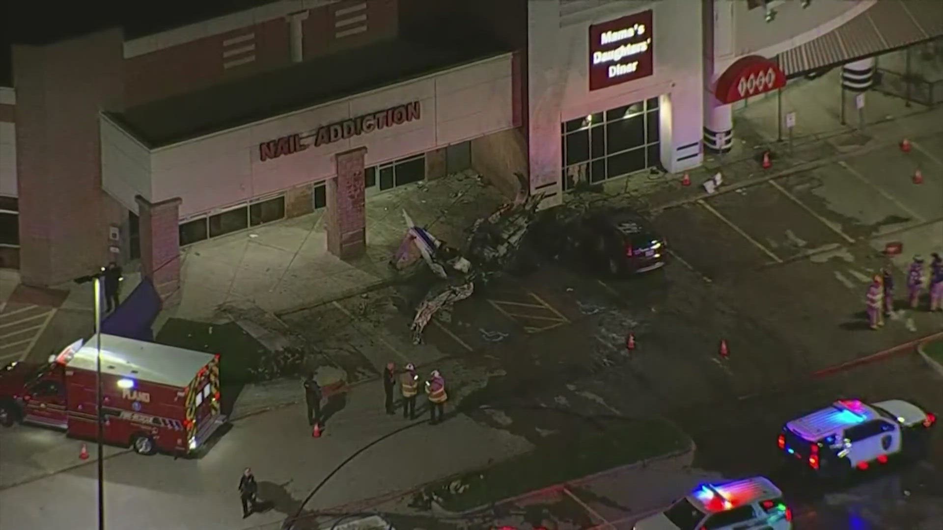 The FAA confirmed that only the pilot was on board when the plane came down at a shopping center.
