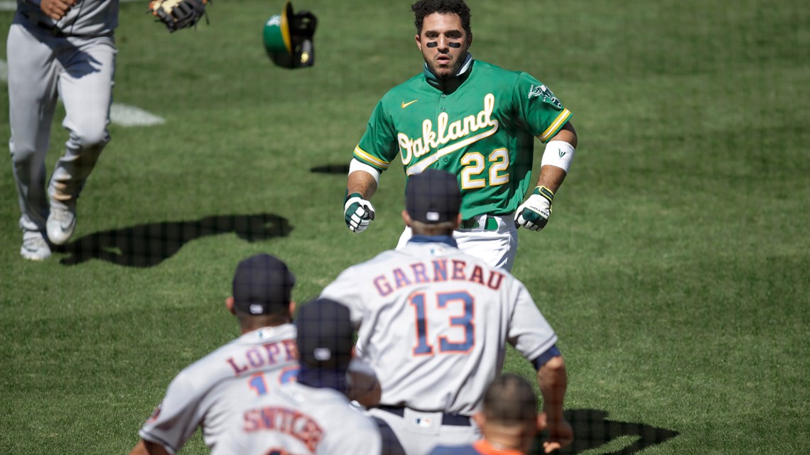 Astros, A's clear benches