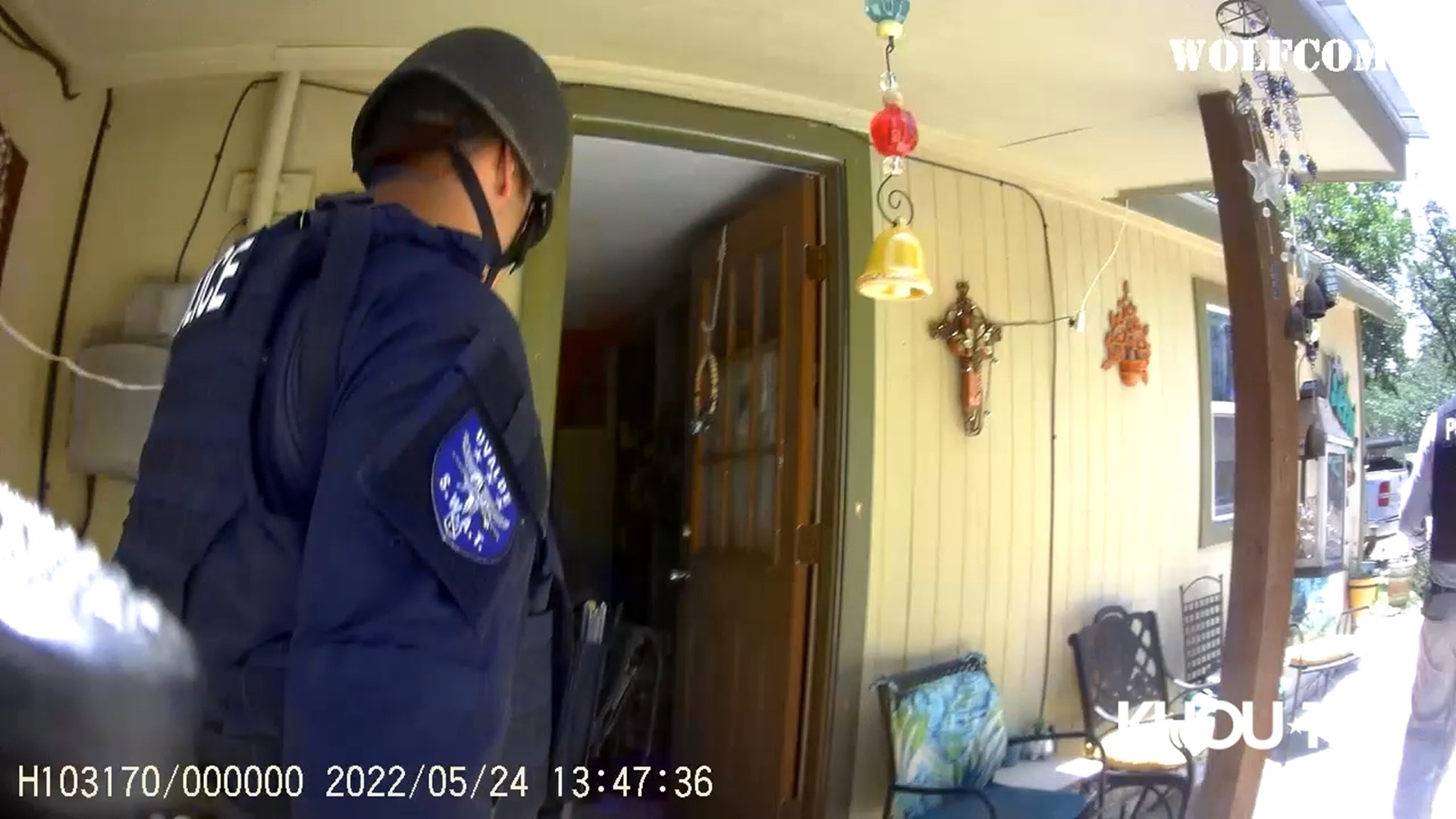 In his footage, Zamora can be seen entering the home of the shooter as the voice of a woman shouting can be heard in the background.