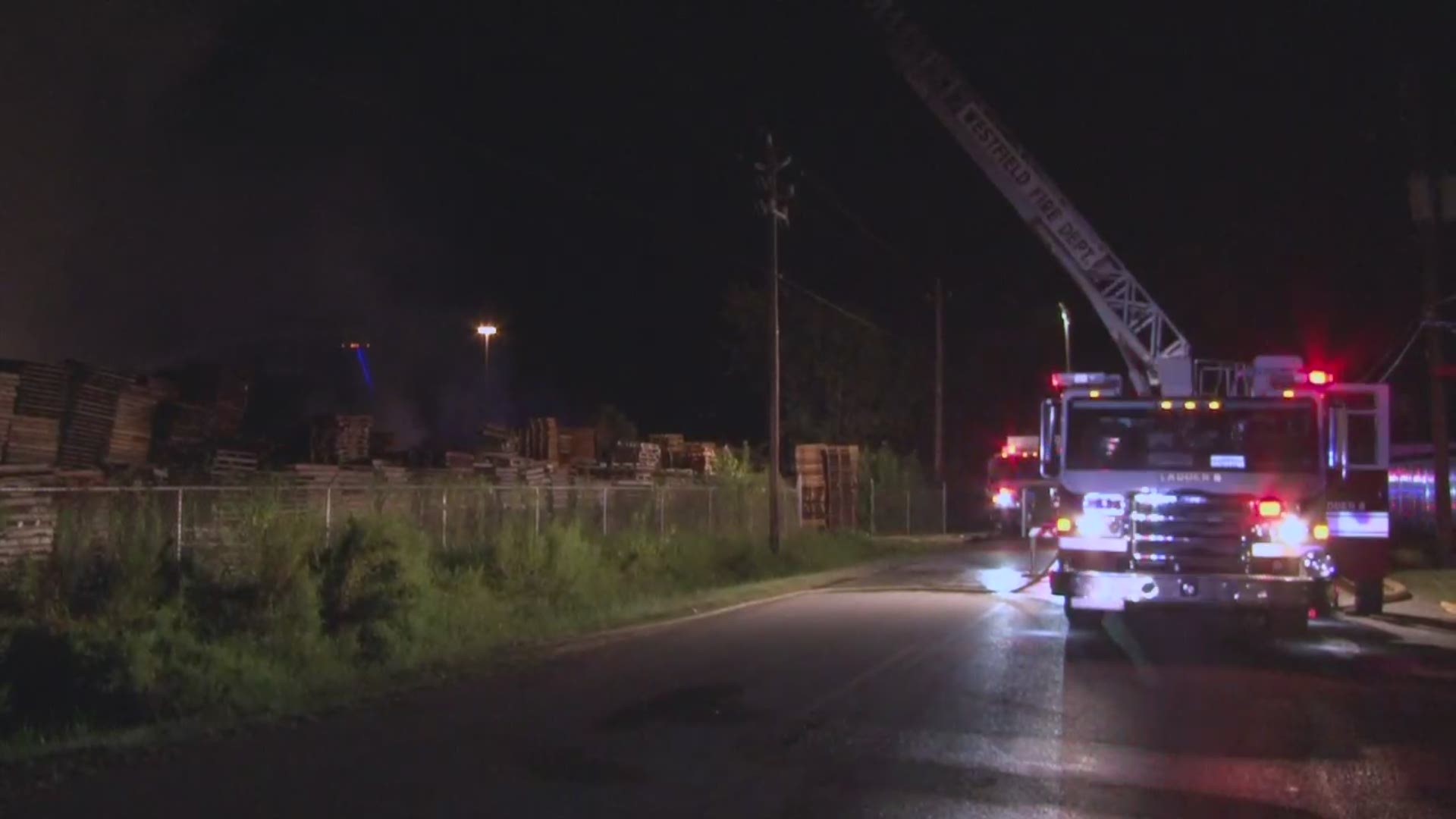 Authorities are investigating the cause of a large fire in northeast Harris County that destroyed a pallet company early Saturday morning.